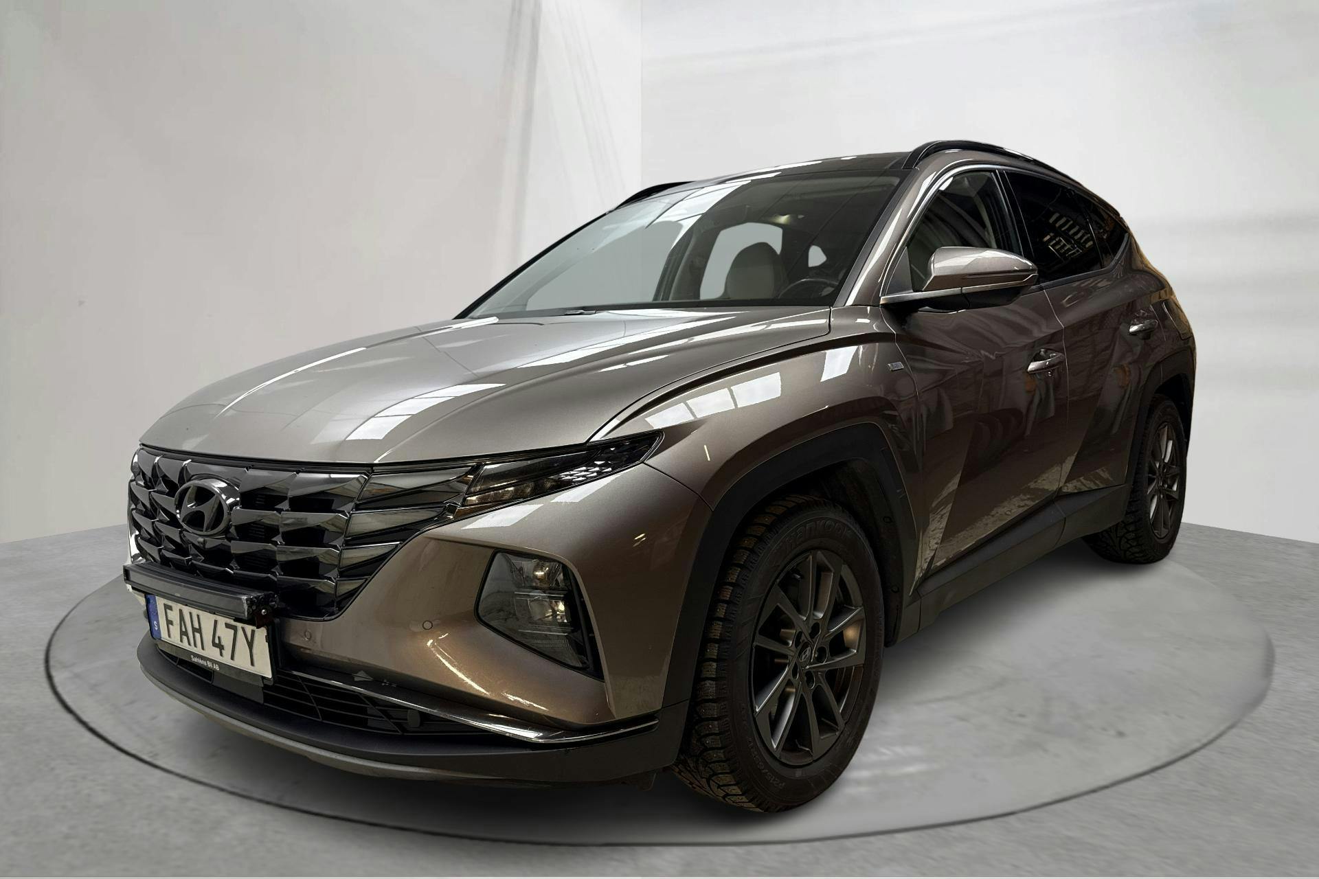 Presentationsfoto 1 av 16: Hyundai Tucson 1.6 T-GDi 4WD (180hk) - 10 303 mil - Automat - brun - 2021