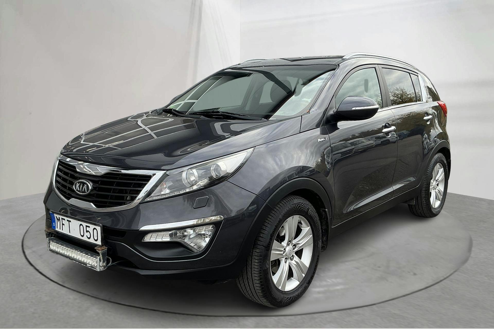 Presentationsfoto 1 av 14: KIA Sportage 2.0 CRDi AWD (184hk) - 17 098 mil - Manuell - Dark Grey - 2012