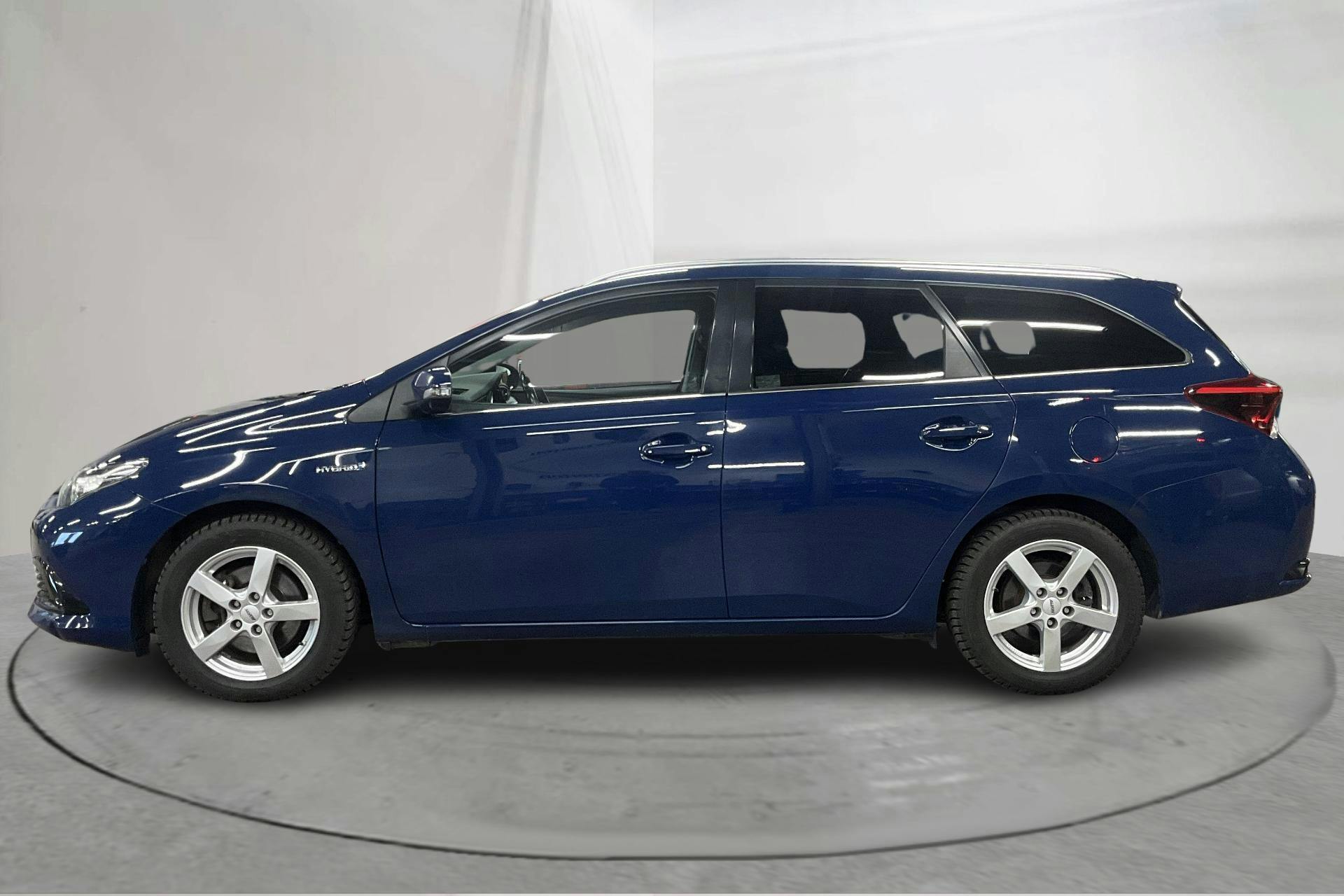 Presentationsfoto 2 av 15: Toyota Auris 1.8 HSD Touring Sports (99hk) - 18 359 mil - Automat - Dark Blue - 2017