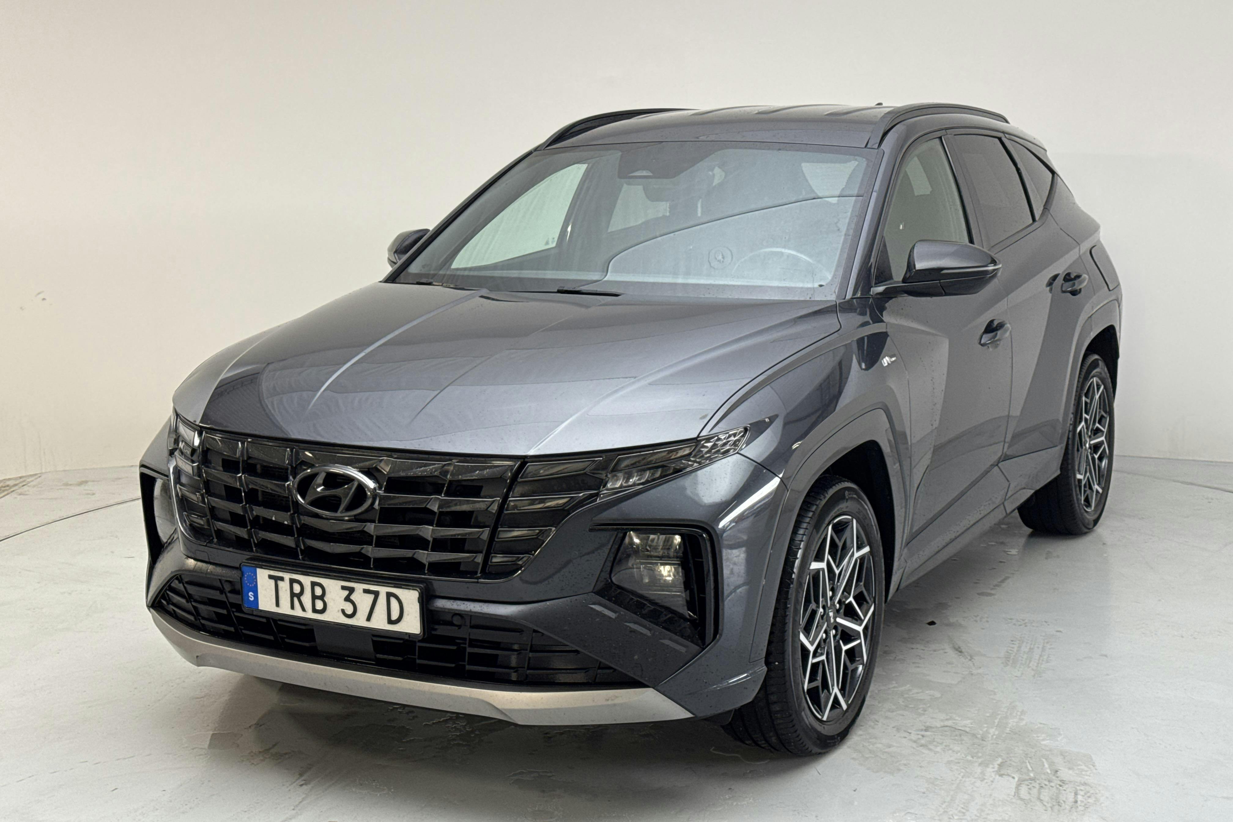 Presentation photo 1 of 15: Hyundai Tucson 1.6 GDI Hybrid 4WD (230hk) - 123 810 km - Automatic - gray - 2021