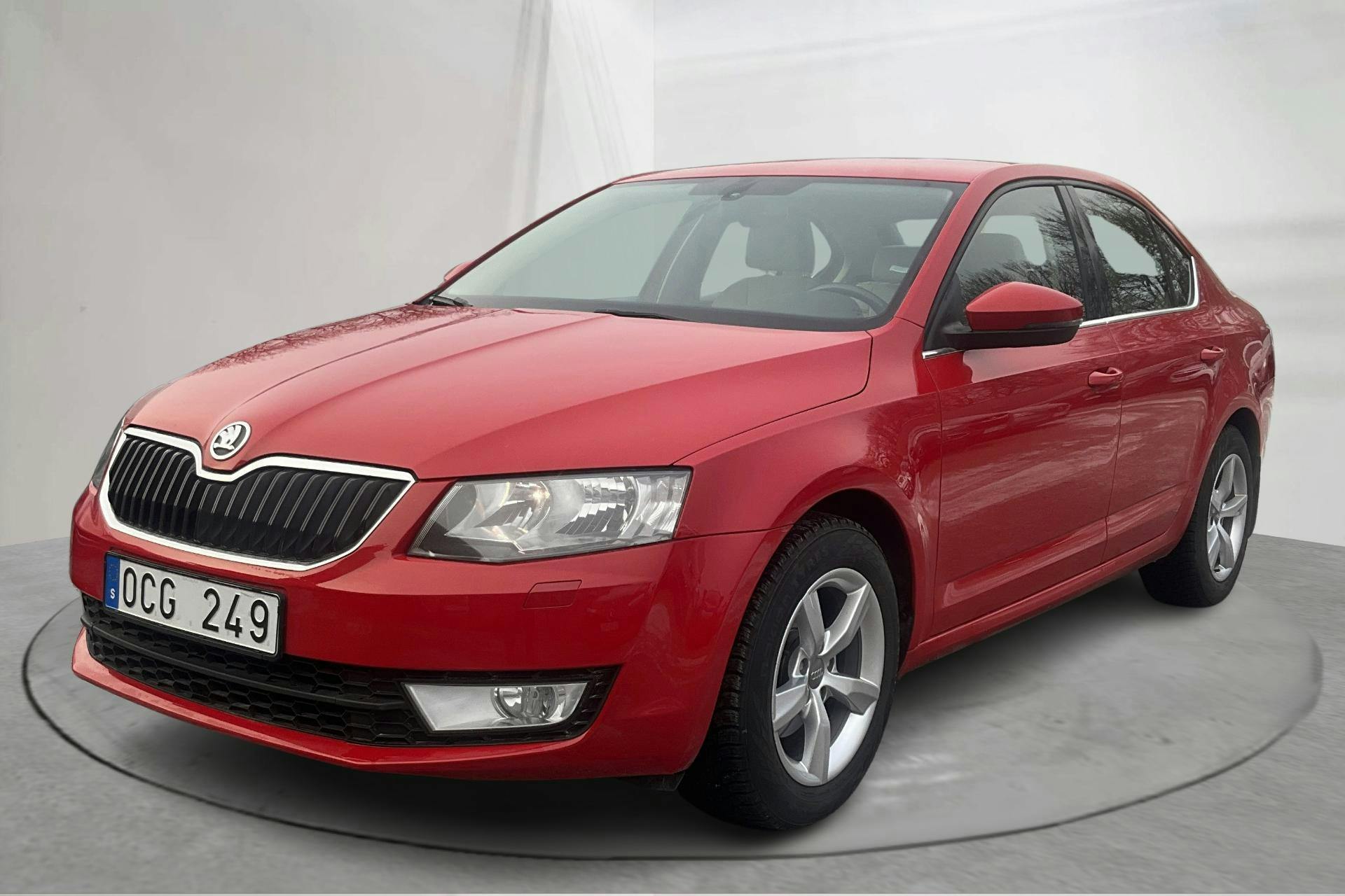 Presentation photo 1 of 14: Skoda Octavia III 1.2 TSI (105hk) - 154 170 km - Automatic - red - 2014