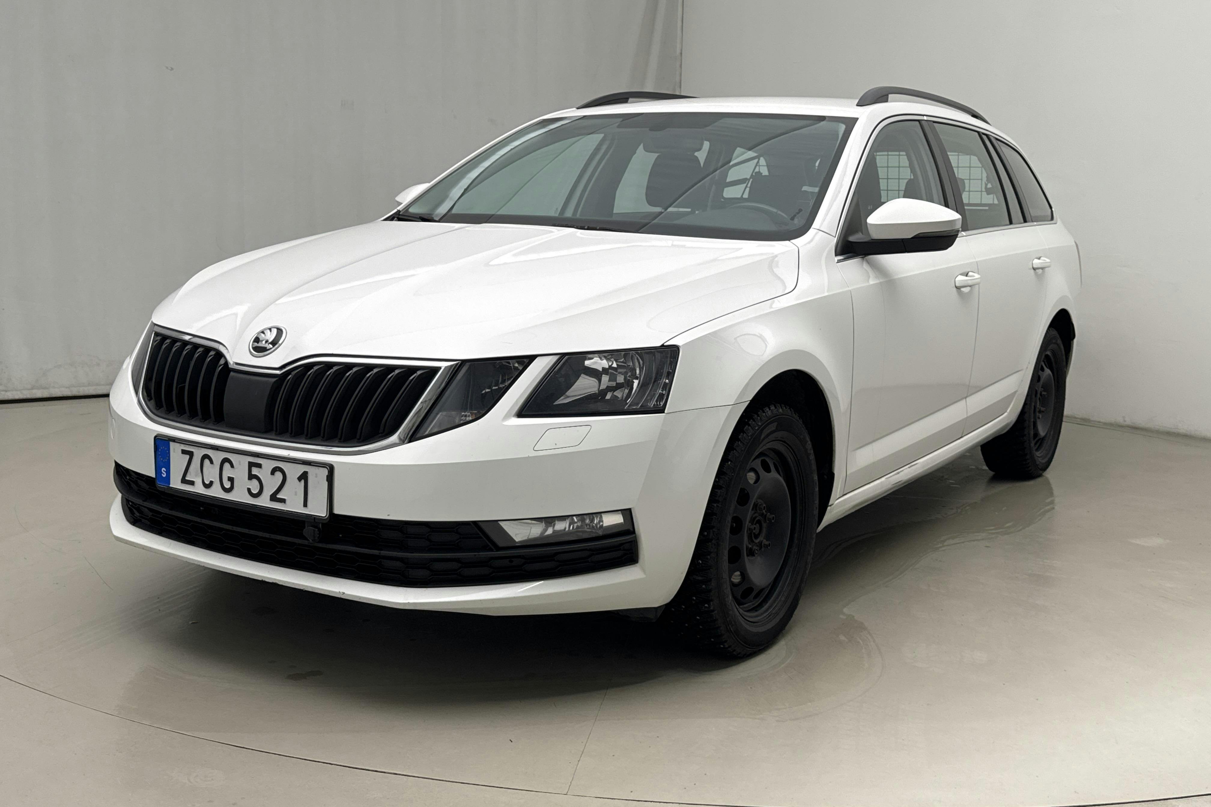Presentationsfoto 1 av 17: Skoda Octavia III 2.0 TDI CR Combi 4x4 (150hk) - 15 491 mil - Manuell - vit - 2018