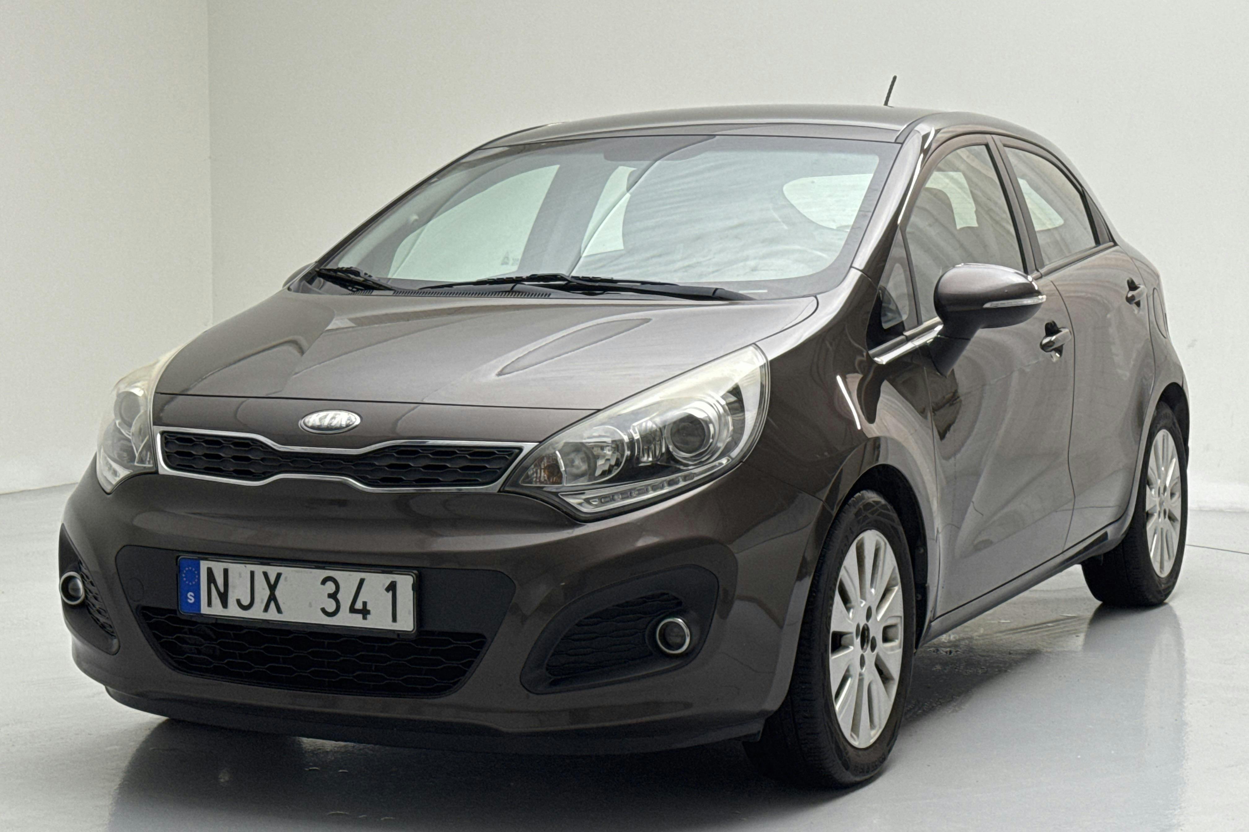 Presentationsfoto 1 av 12: KIA Rio 1.2 (85hk) - 14 286 mil - Manuell - brun - 2014