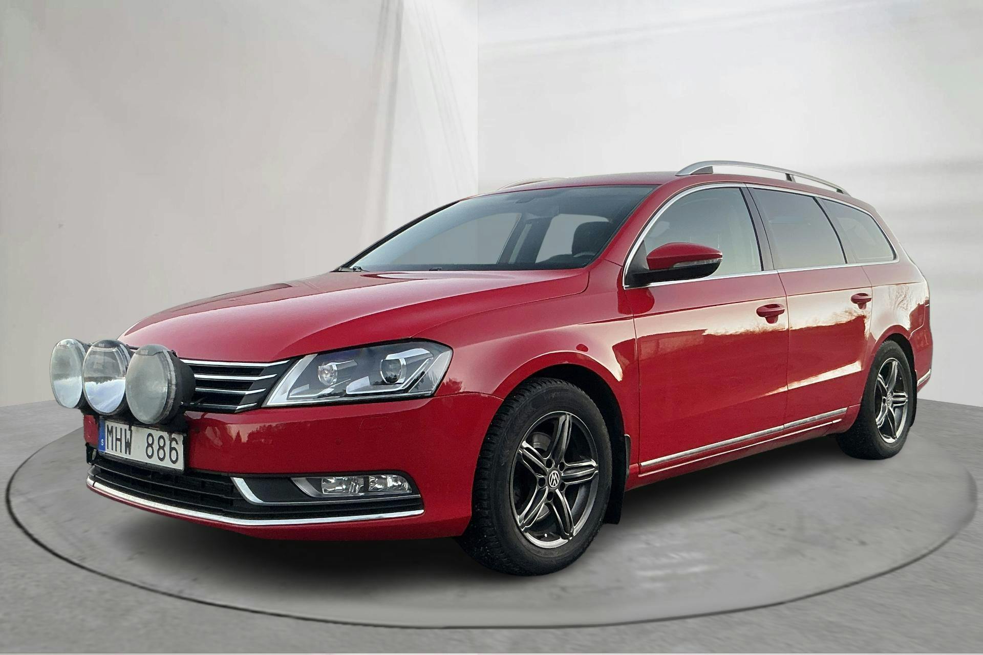 Presentation photo 1 of 14: VW Passat 2.0 TDI BlueMotion Technology Variant 4Motion (170hk) - 255 070 km - Automatic - red - 2012