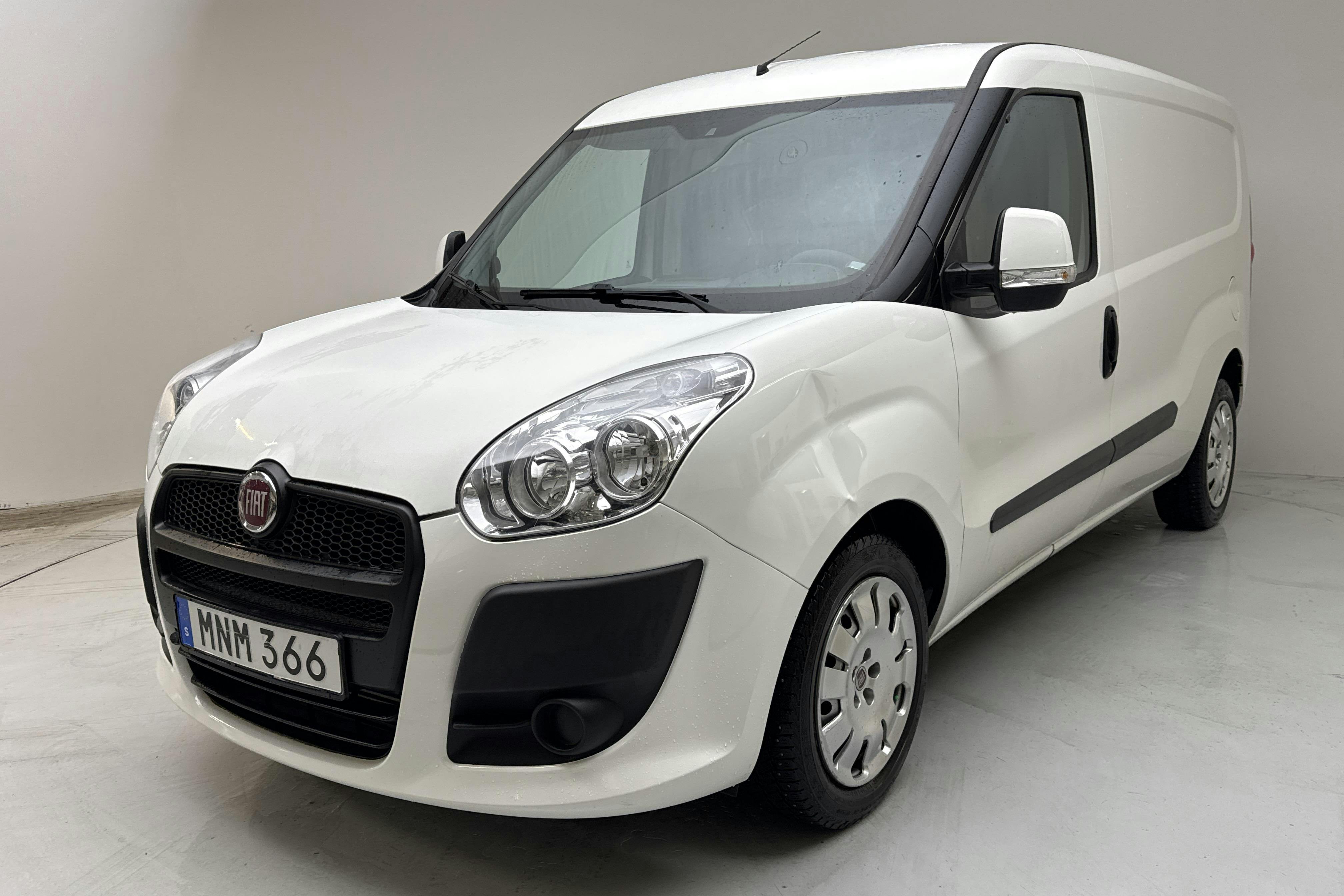 Presentationsfoto 1 av 11: Fiat Doblo Cargo 1.4 CNG (95hk) - 9 833 mil - Manuell - vit - 2014