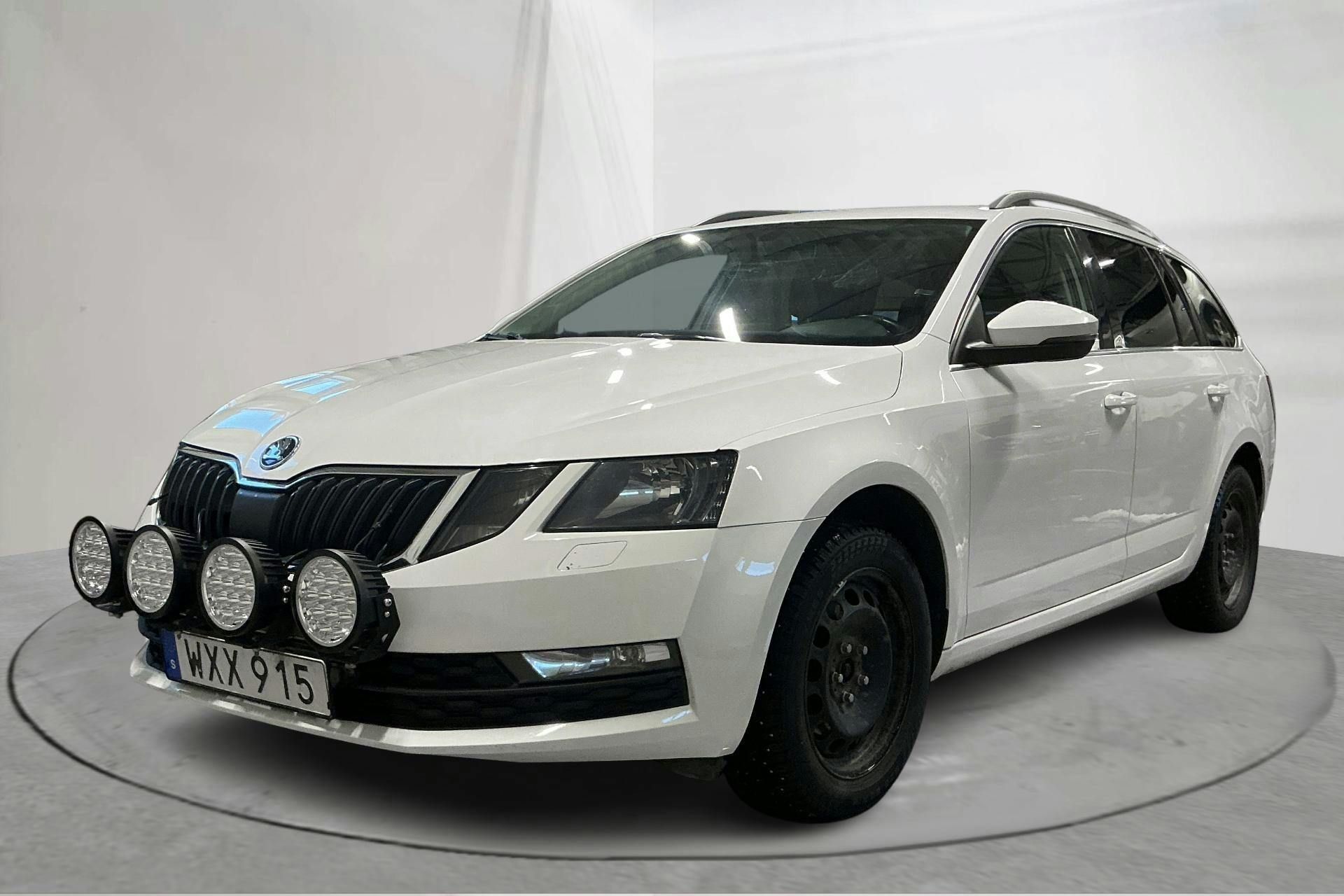 Presentation photo 1 of 14: Skoda Octavia III 2.0 TDI CR Combi 4x4 (150hk) - 196 390 km - Manual - white - 2018
