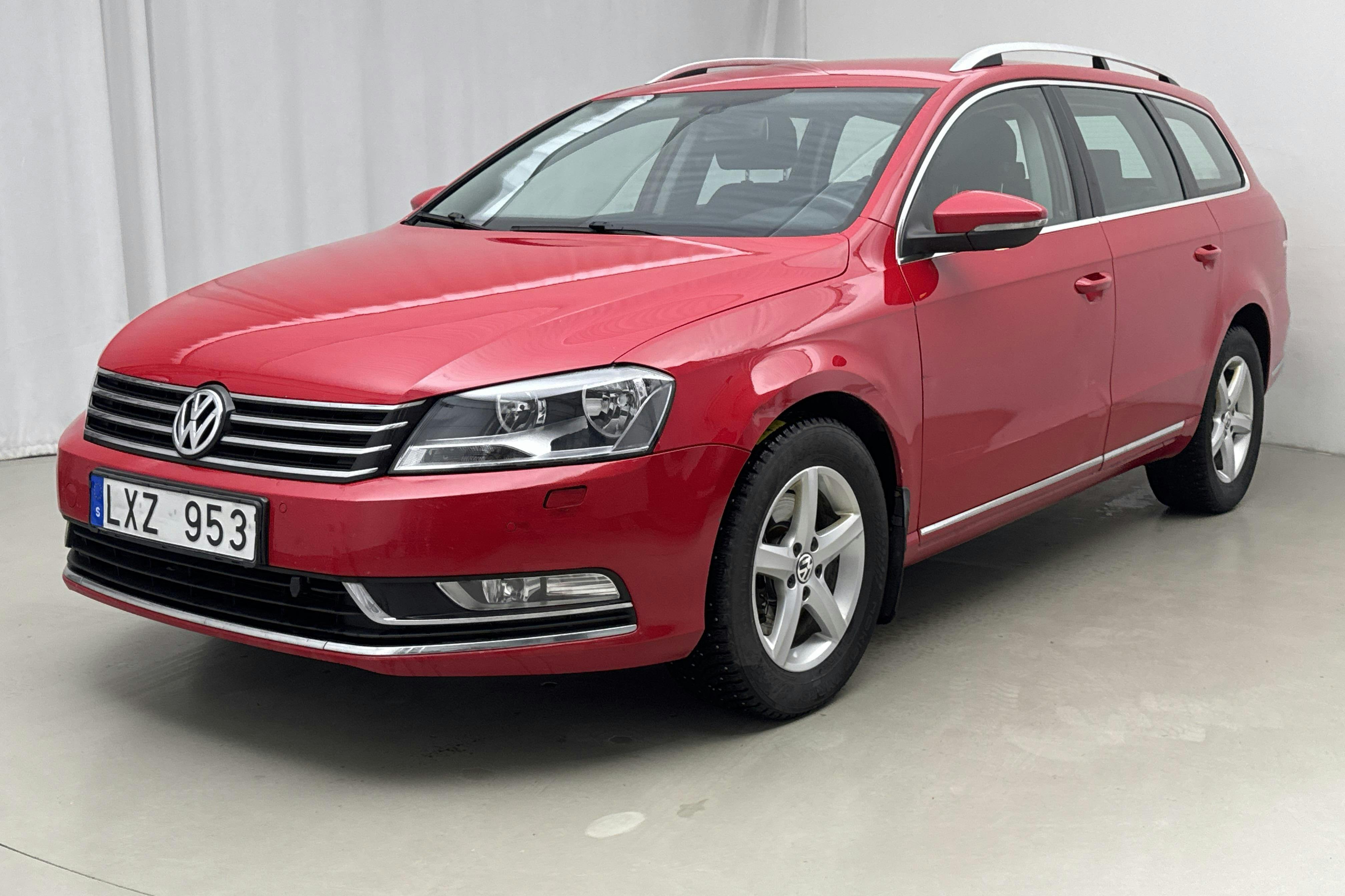 Presentation photo 1 of 12: VW Passat 1.4 TSI EcoFuel Variant (150hk) - 136 500 km - Manual - red - 2012