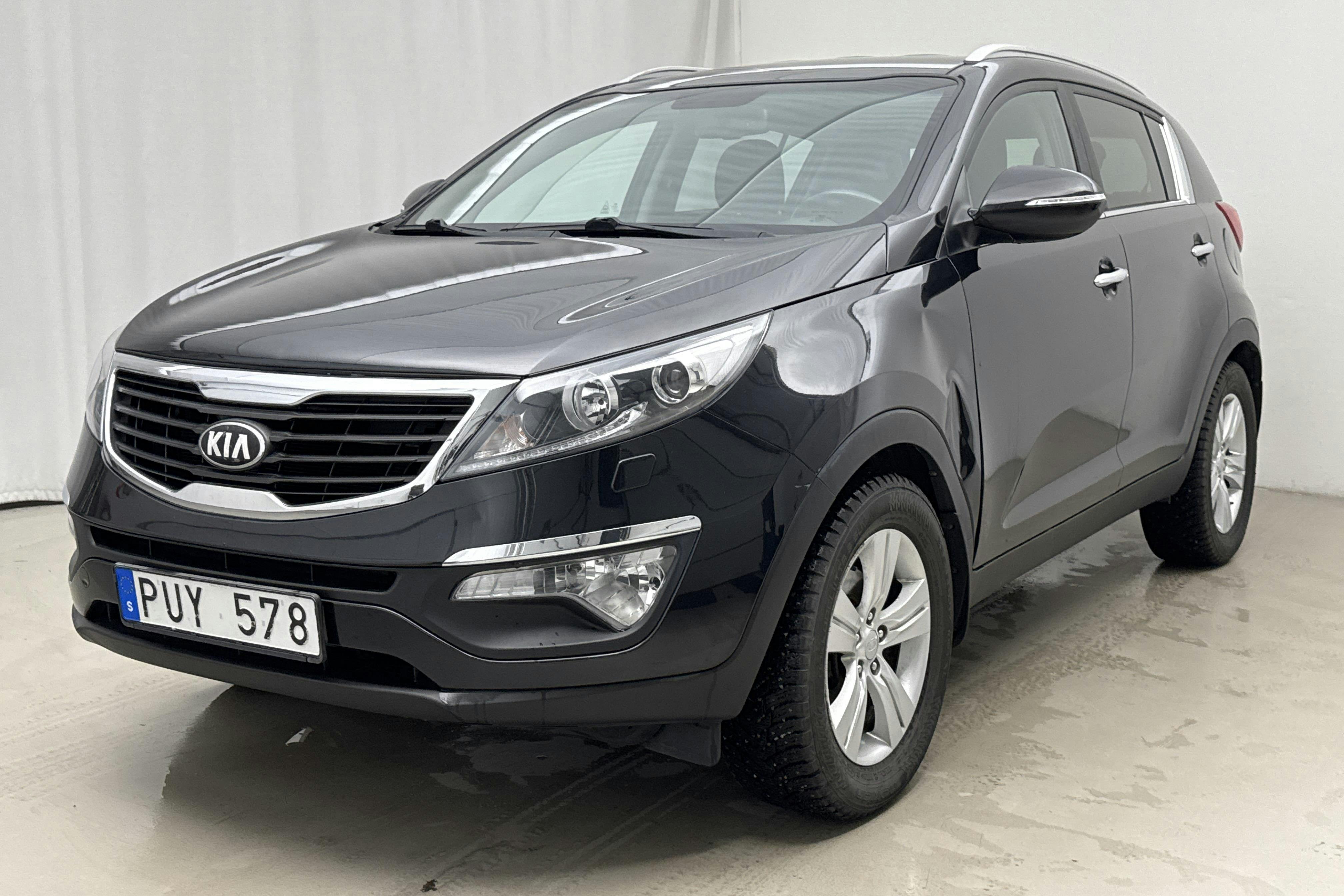 Presentation photo 1 of 12: KIA Sportage 1.6 2WD (136hk) - 146 070 km - Manual - black - 2013