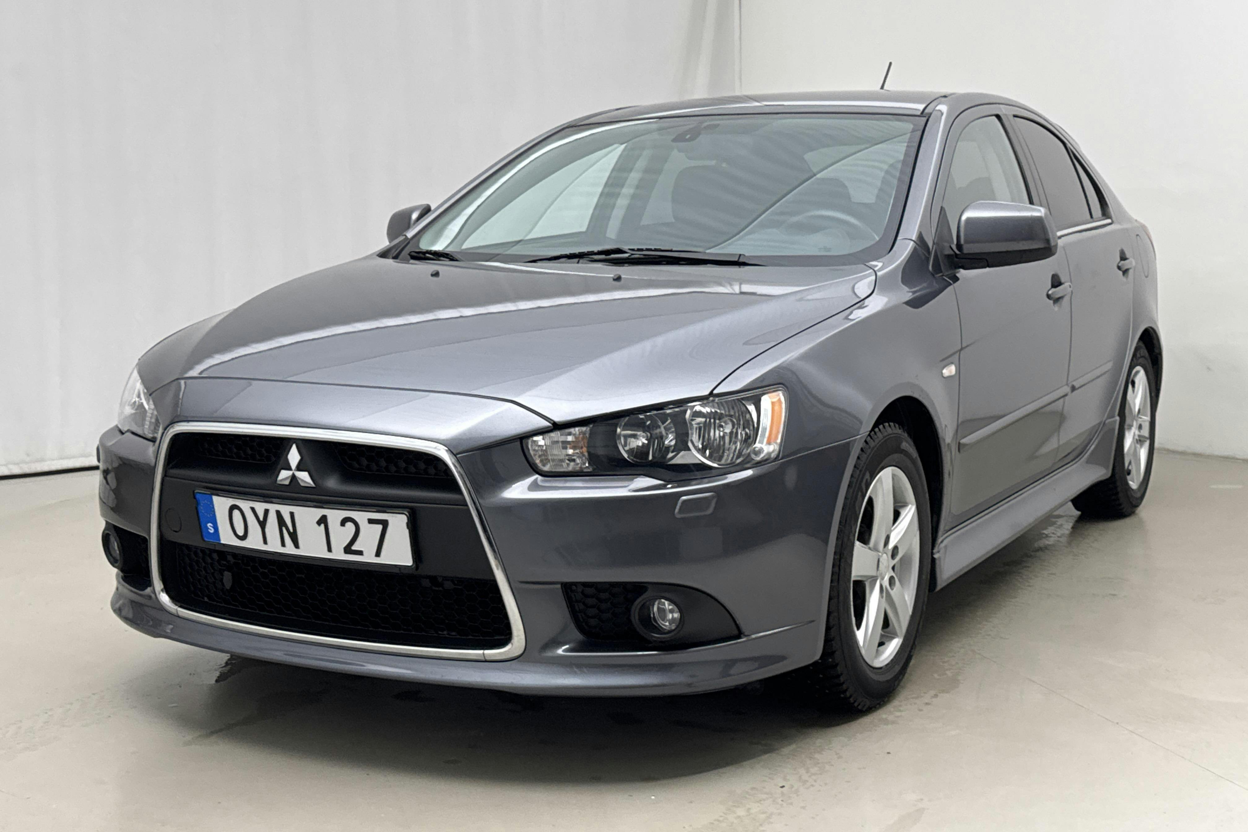 Presentation photo 1 of 16: Mitsubishi Lancer 1.8 Sportback (140hk) - 66 480 km - Manual - Dark Grey - 2011