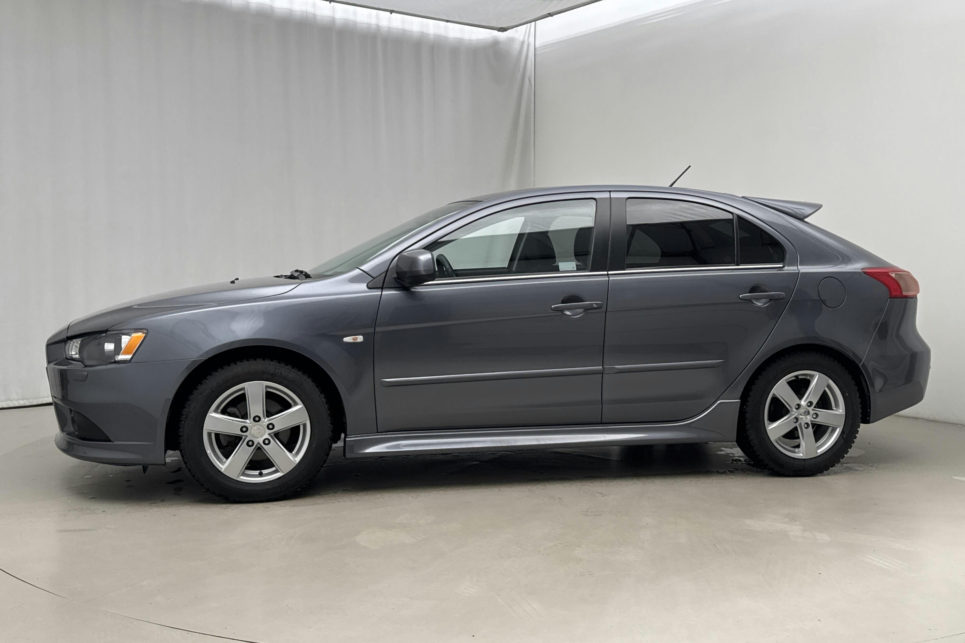 Presentation photo 2 of 16: Mitsubishi Lancer 1.8 Sportback (140hk) - 66 480 km - Manual - Dark Grey - 2011