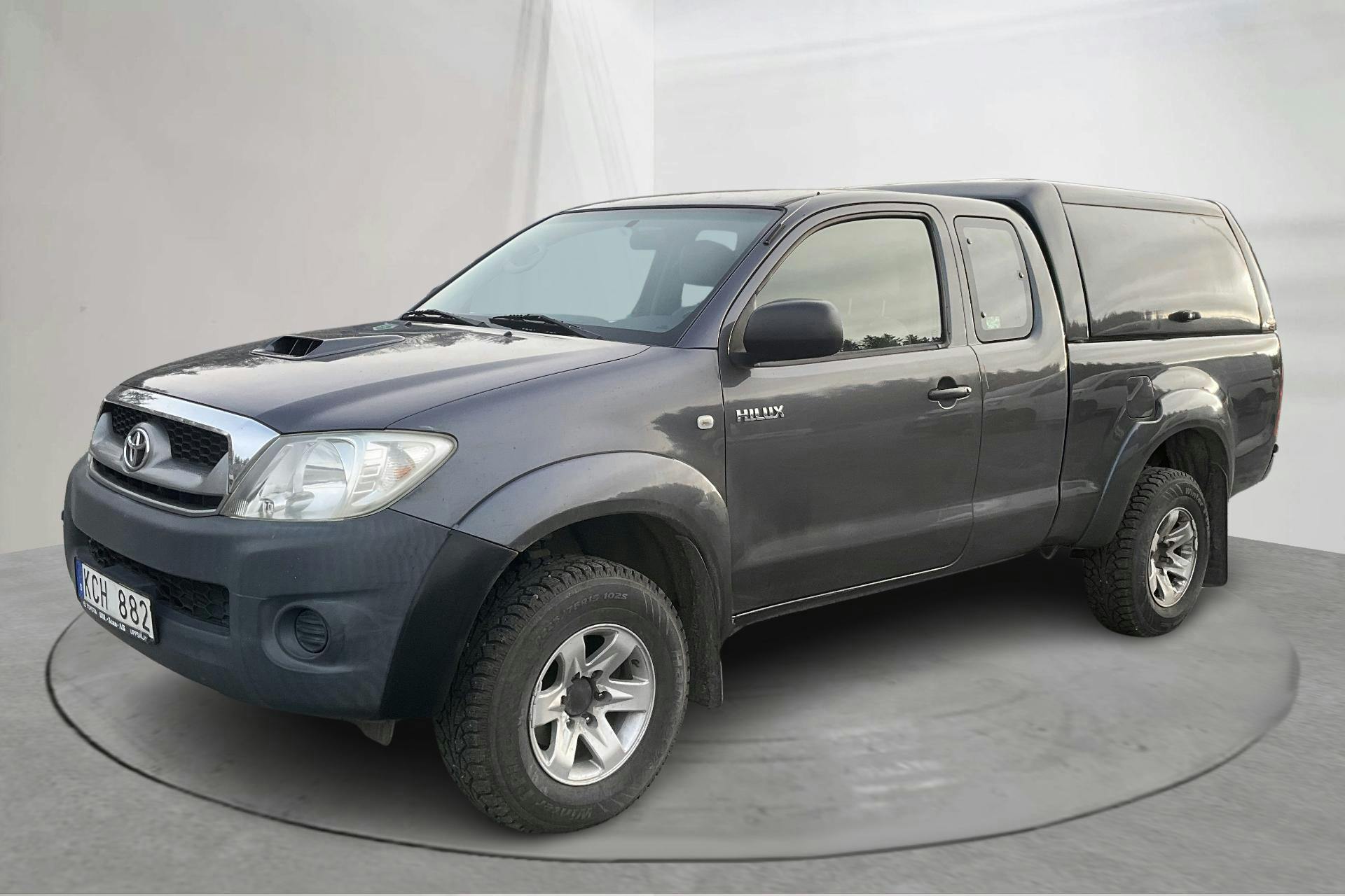Presentation photo 1 of 13: Toyota Hilux 2.5 D-4D 4WD (120hk) - 208 310 km - Manual - Dark Grey - 2009