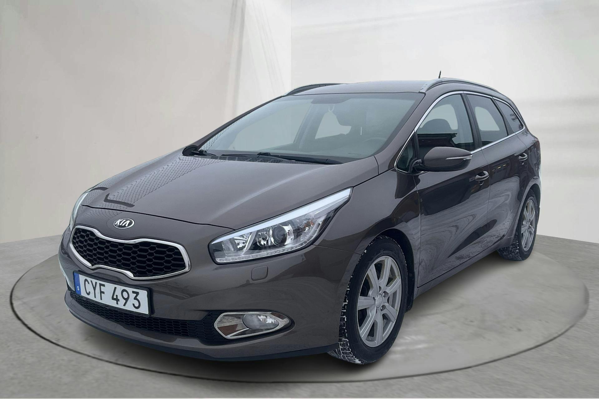 Presentation photo 1 of 16: KIA Cee'd 1.6 SW (135hk) - 209 580 km - Automatic - green - 2015