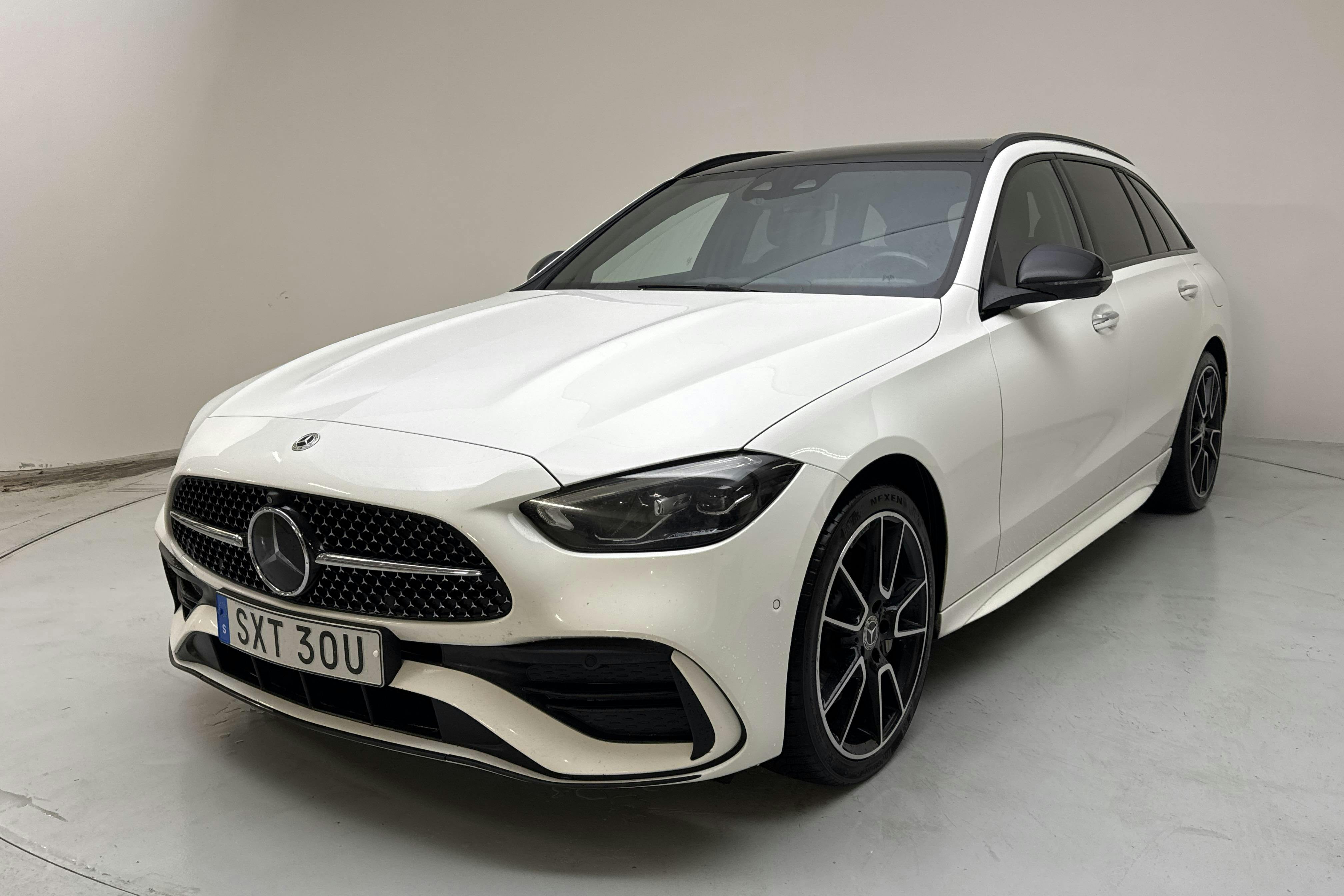 Presentation photo 1 of 16: Mercedes C 300 e Kombi S206 (333hk) - 141 570 km - Automatic - white - 2023