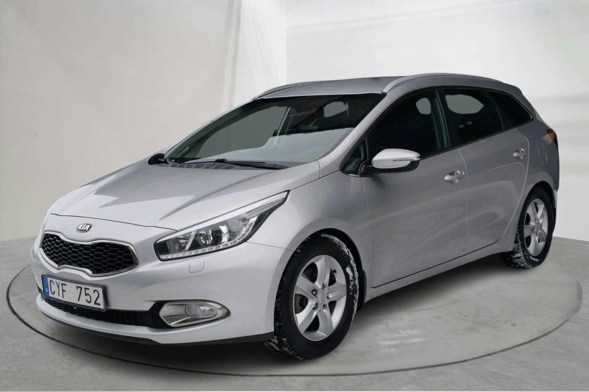 Presentation photo 1 of 13: KIA Cee'd 1.6 CRDi SW (128hk) - 80 630 km - Manual - gray - 2013