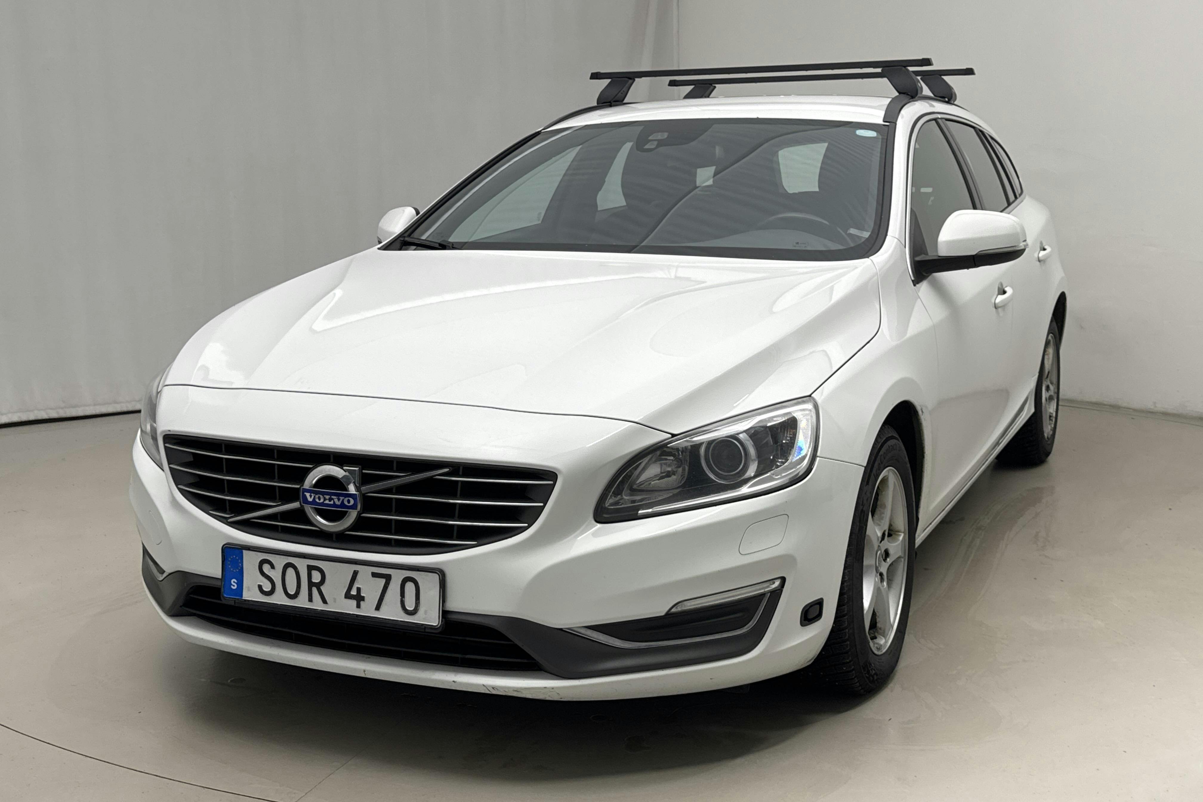 Presentationsfoto 1 av 14: Volvo V60 D2 (115hk) - 23 284 mil - Automat - vit - 2014