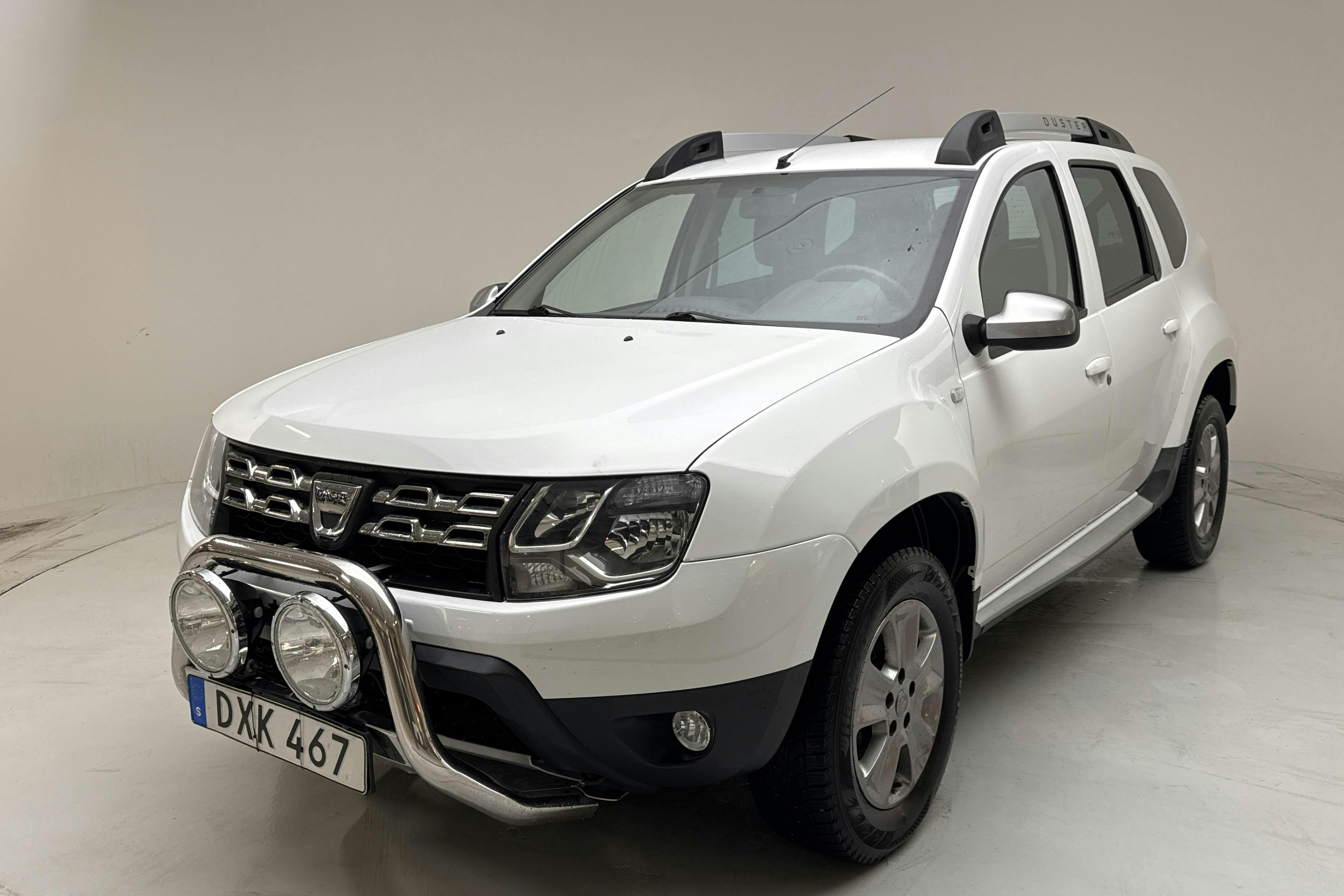 Presentation photo 1 of 12: Dacia Duster 1.5 dCi 4x4 (109hk) - 104 210 km - Manual - white - 2015