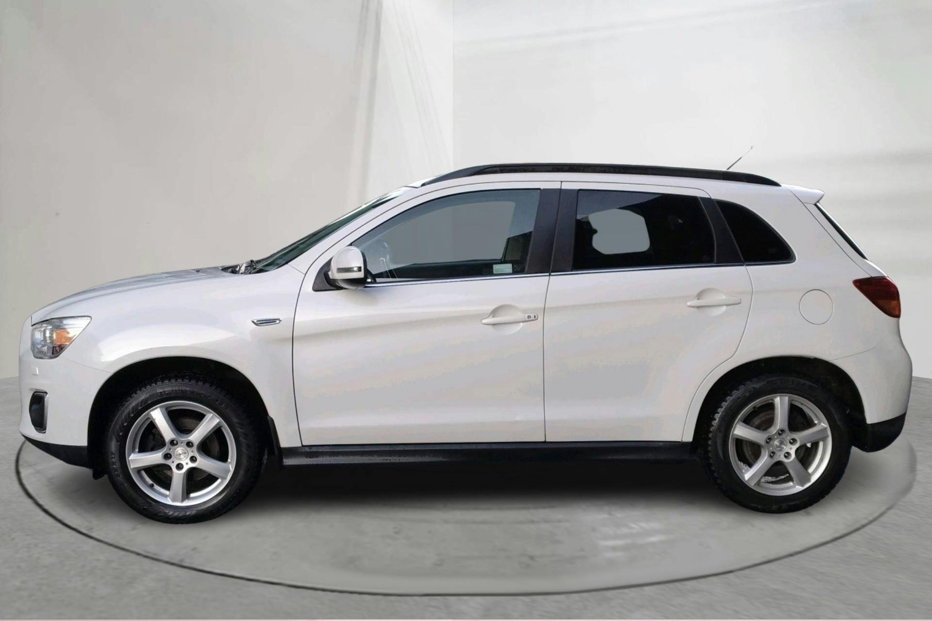 Zdjęcie prezentacyjne 2 z 16: Mitsubishi ASX 2.2D 4WD (150hk) - 234 730 km - Automatyczna - biały - 2014