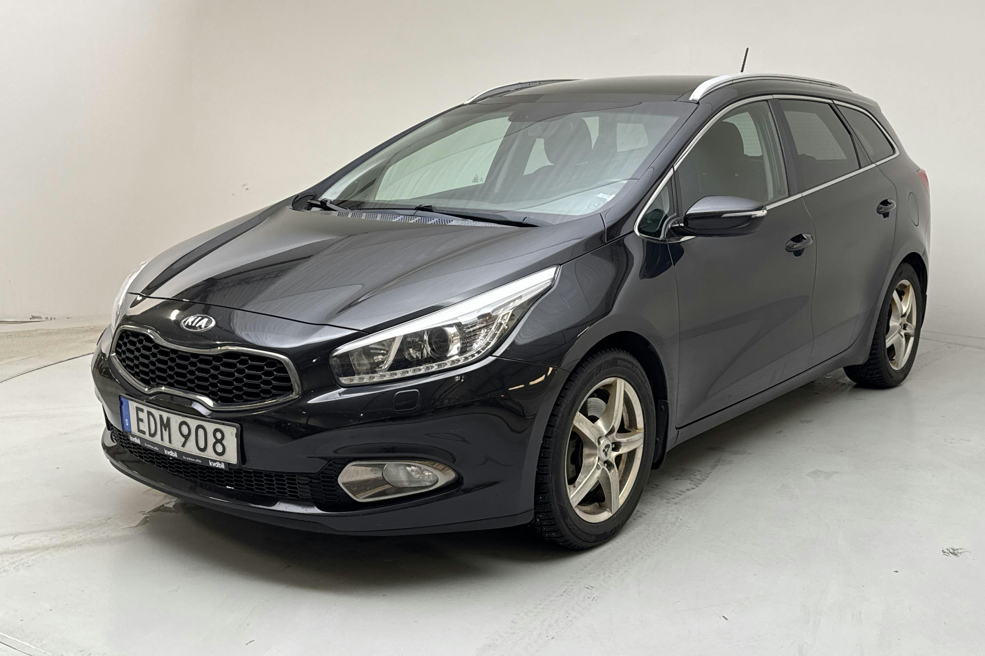 Presentation photo 1 of 14: KIA Cee'd 1.6 CRDi SW (128hk) - 226 830 km - Manual - black - 2014