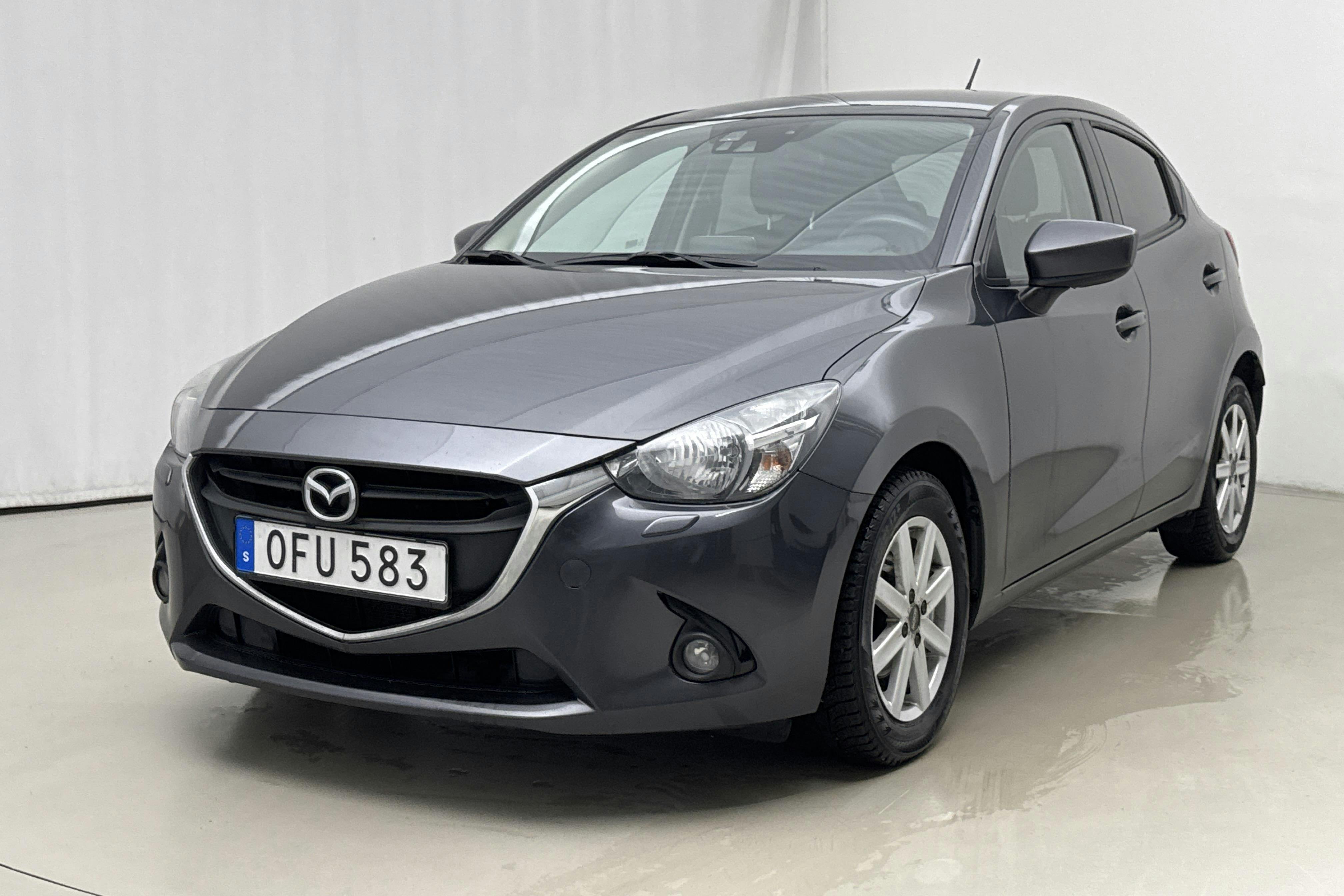 Presentation photo 1 of 17: Mazda 2 1.5 5dr (90hk) - 178 300 km - Manual - gray - 2016