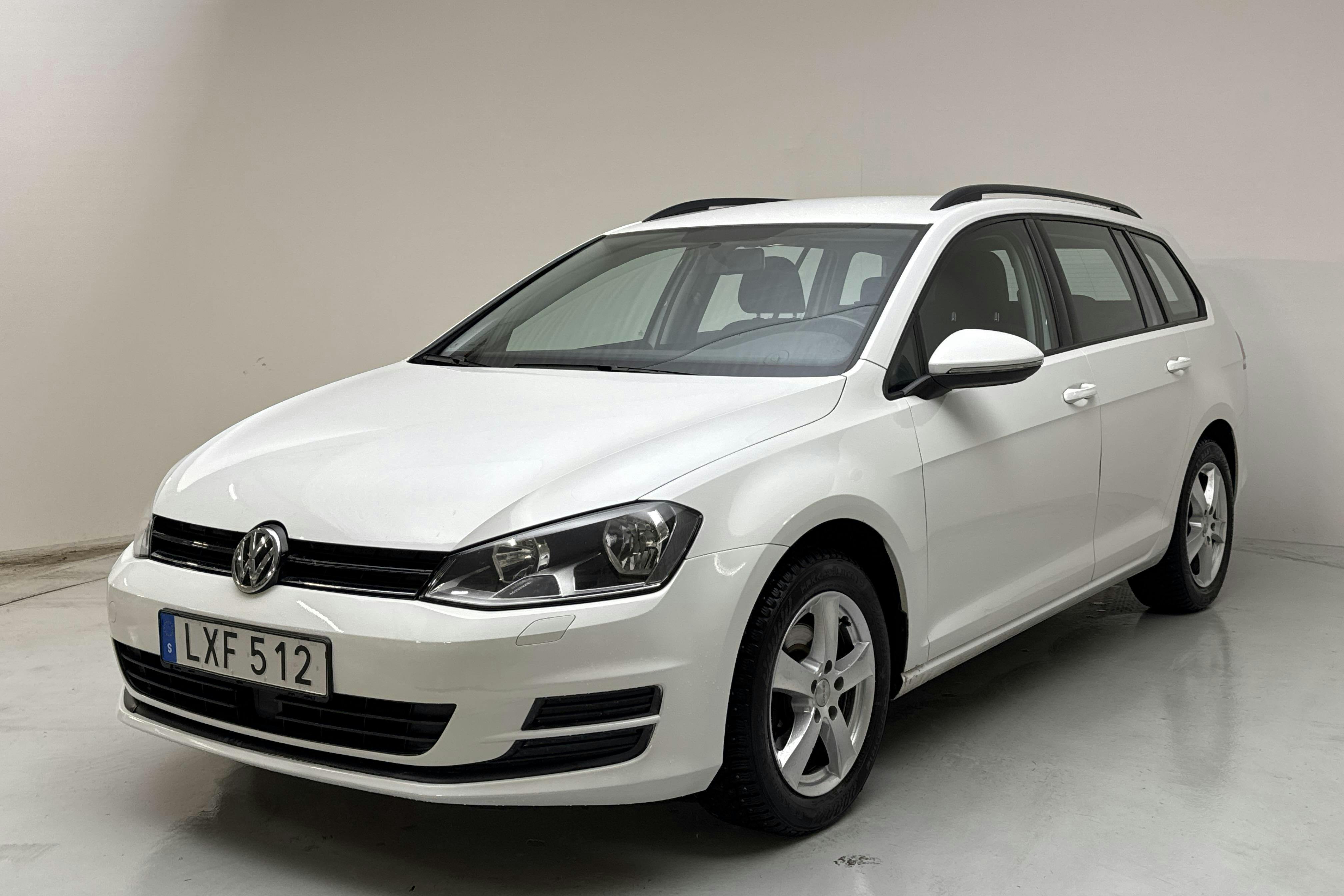 Zdjęcie prezentacyjne 1 z 13: VW Golf VII 1.2 TSI Sportscombi (110hk) - 103 180 km - Automatyczna - biały - 2016