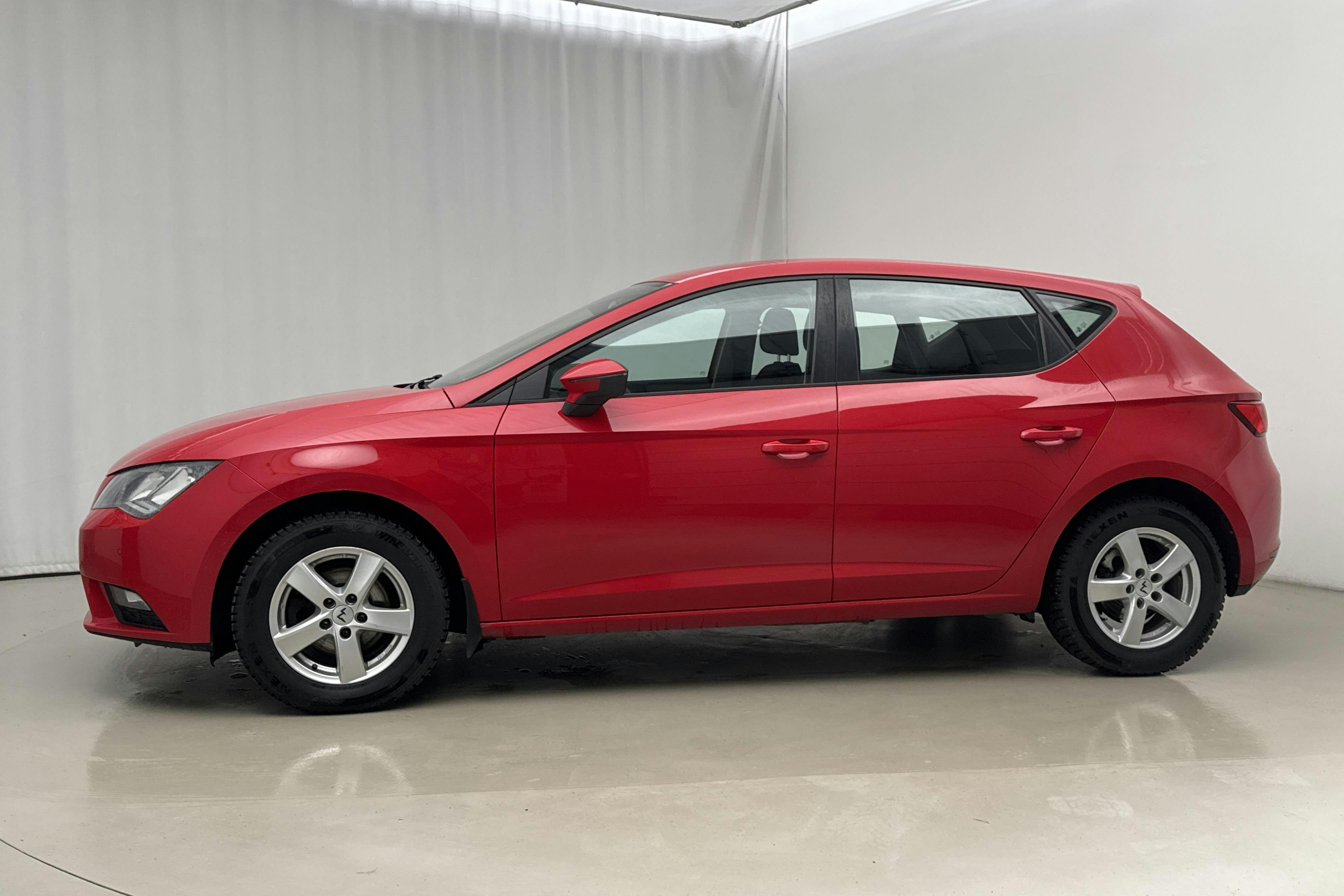 Presentation photo 2 of 17: Seat Leon 1.2 TSI 5dr (105hk) - 185 720 km - Manual - red - 2014