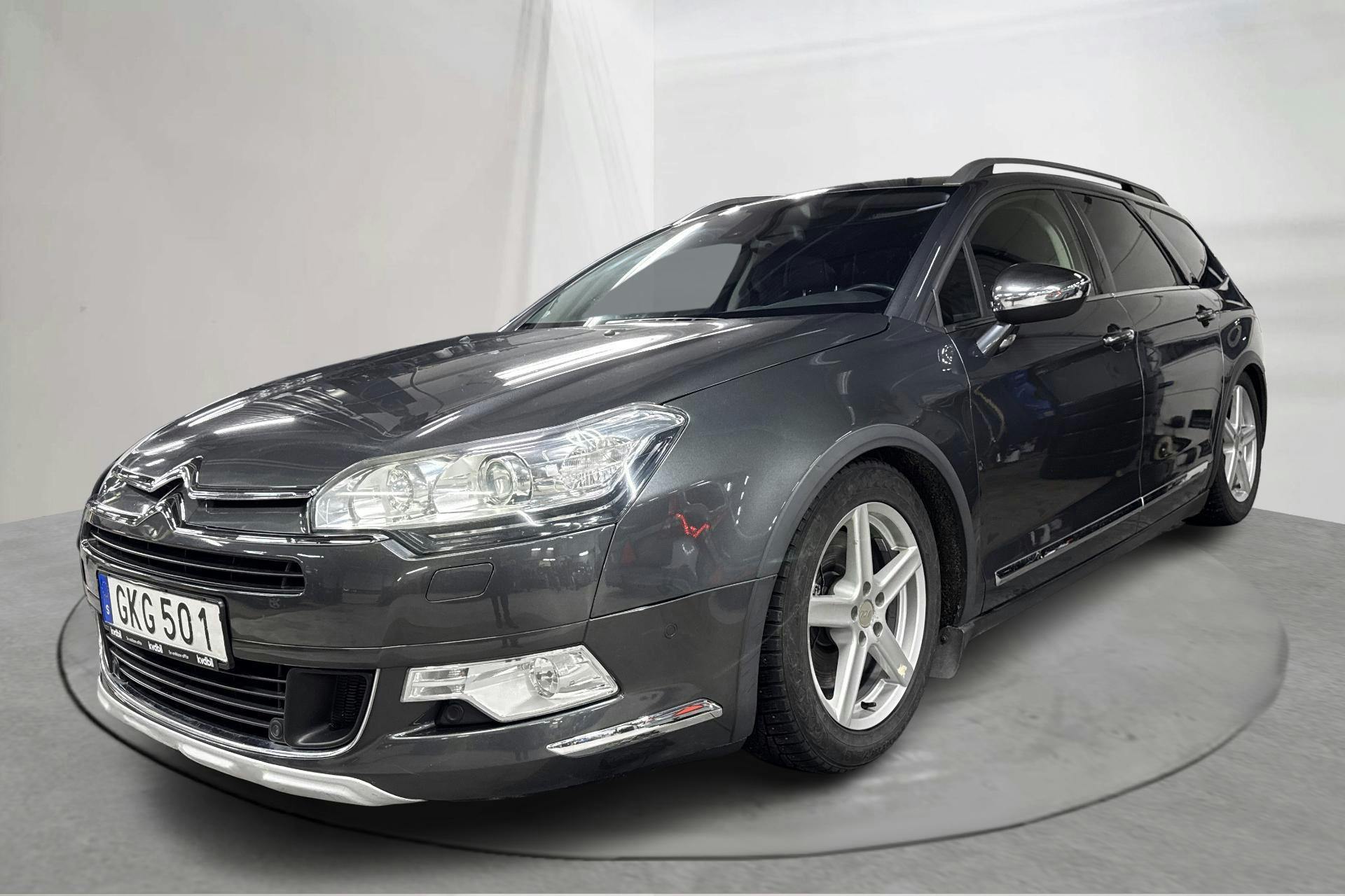 Presentationsfoto 1 av 14: Citroën C5 III 2.2 HDI Tourer (204hk) - 18 601 mil - Automat - grå - 2014