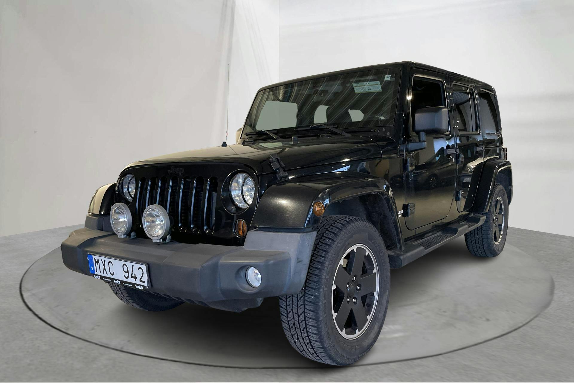 Presentation photo 1 of 16: Jeep Wrangler Unlimited 2.8 CRD (200hk) - 158 170 km - Automatic - black - 2012