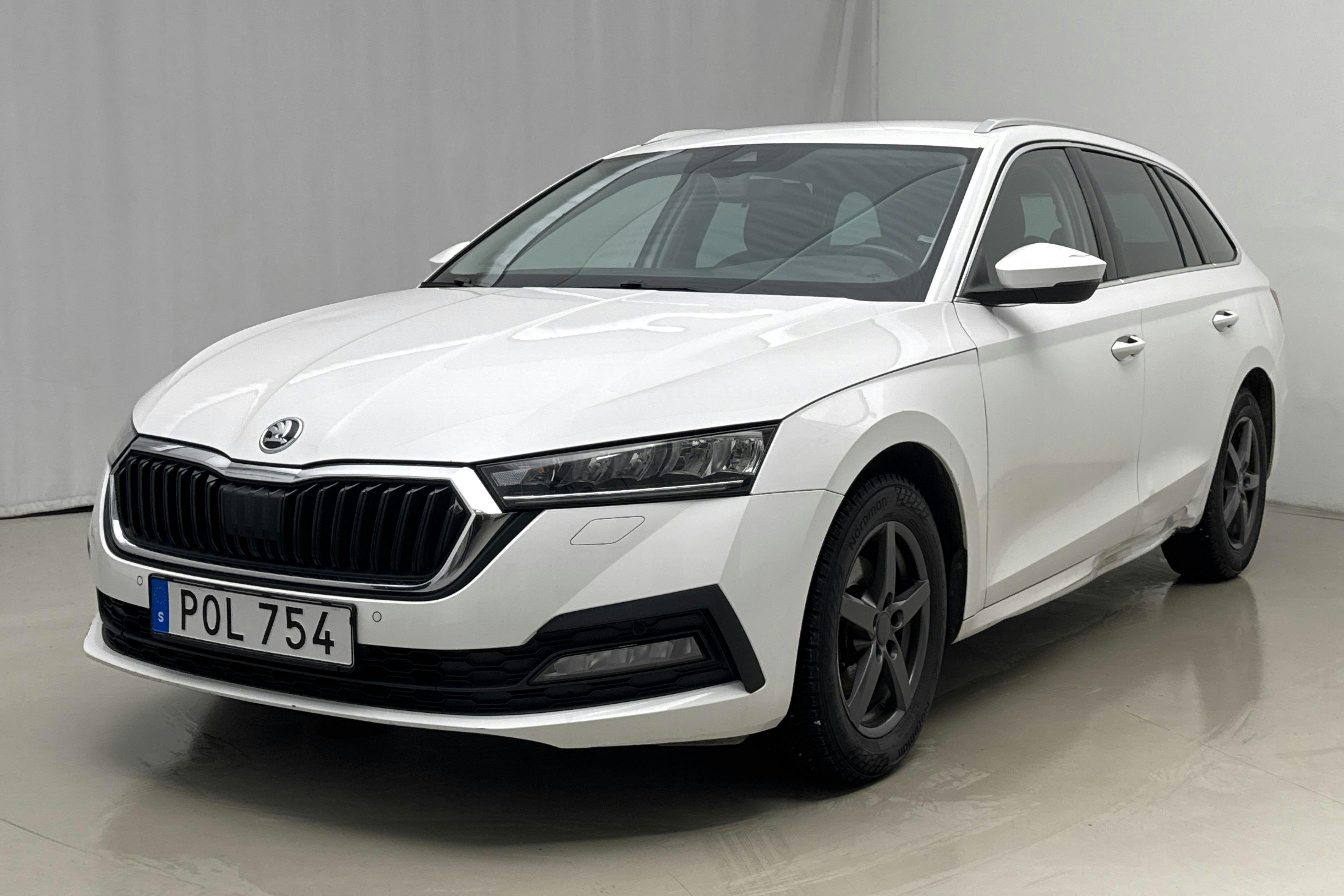 Presentation photo 1 of 19: Skoda Octavia 2.0 TDI Combi (116hk) - 175 830 km - Automatic - white - 2022