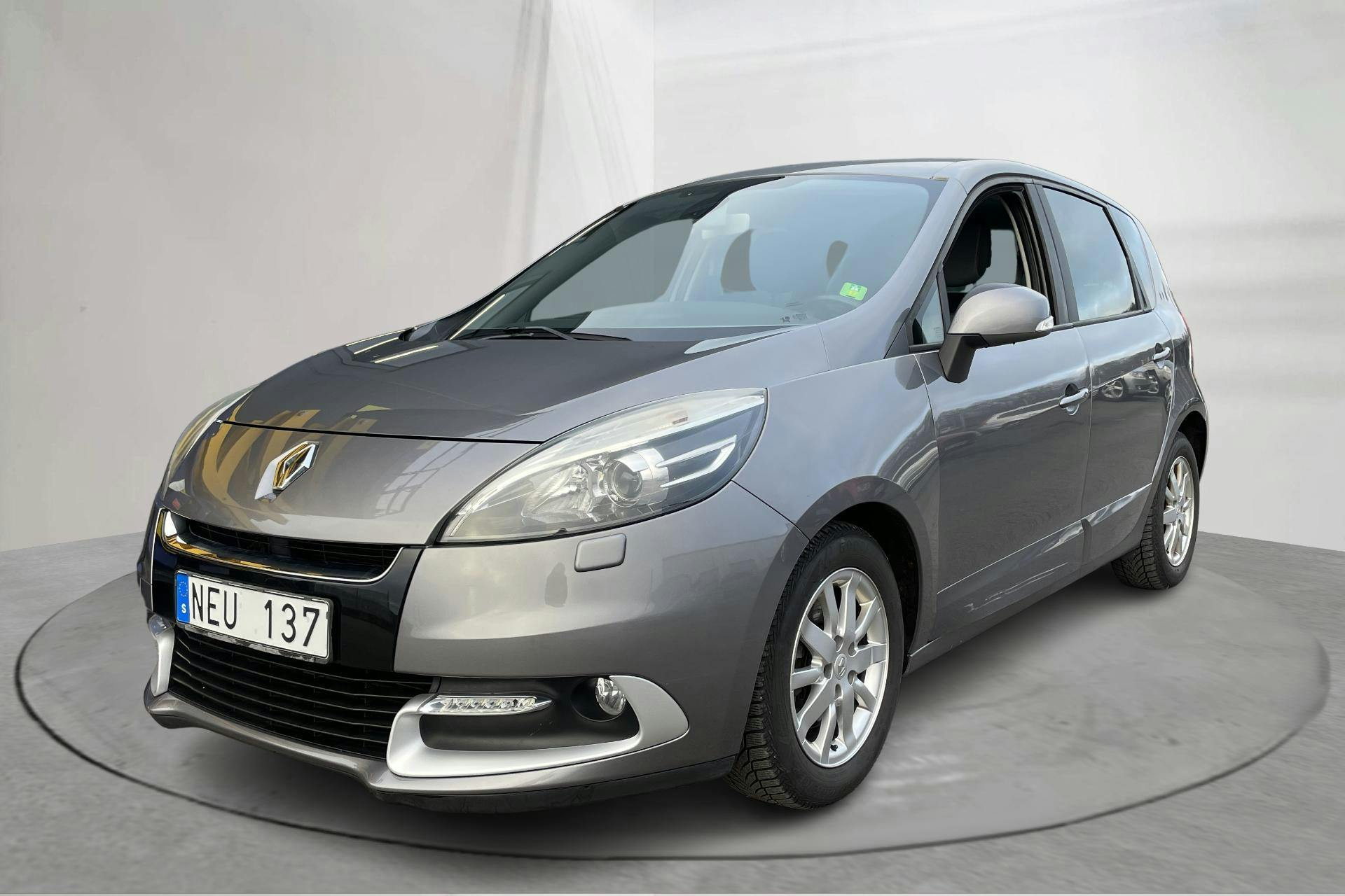 Presentation photo 1 of 16: Renault Scénic III 1.5 dCi FAP (95hk) - 124 720 km - Manual - gray - 2013