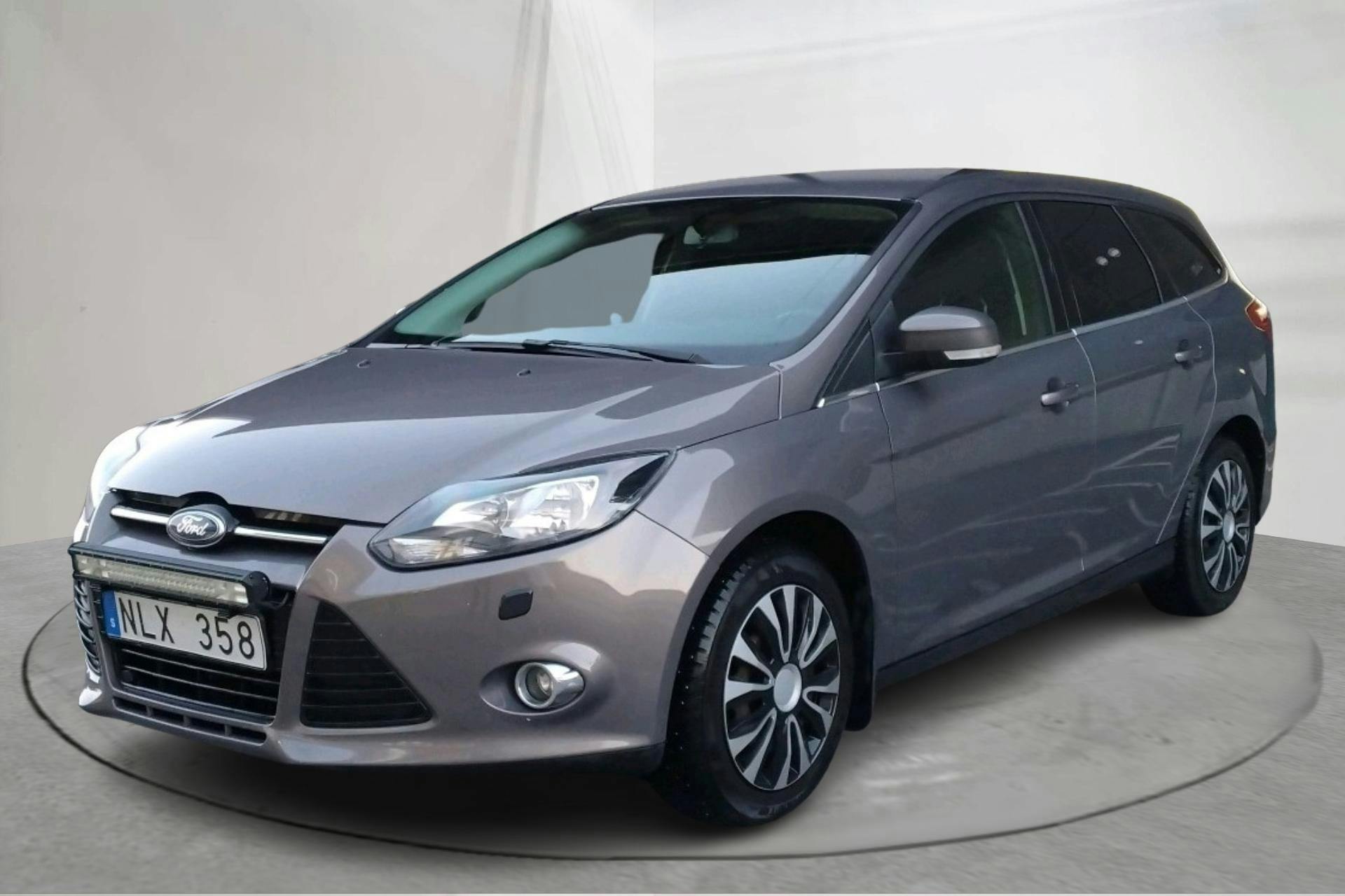 Presentation photo 1 of 13: Ford Focus 2.0 TDCi Kombi (115hk) - 148 470 km - Automatic - brown - 2013