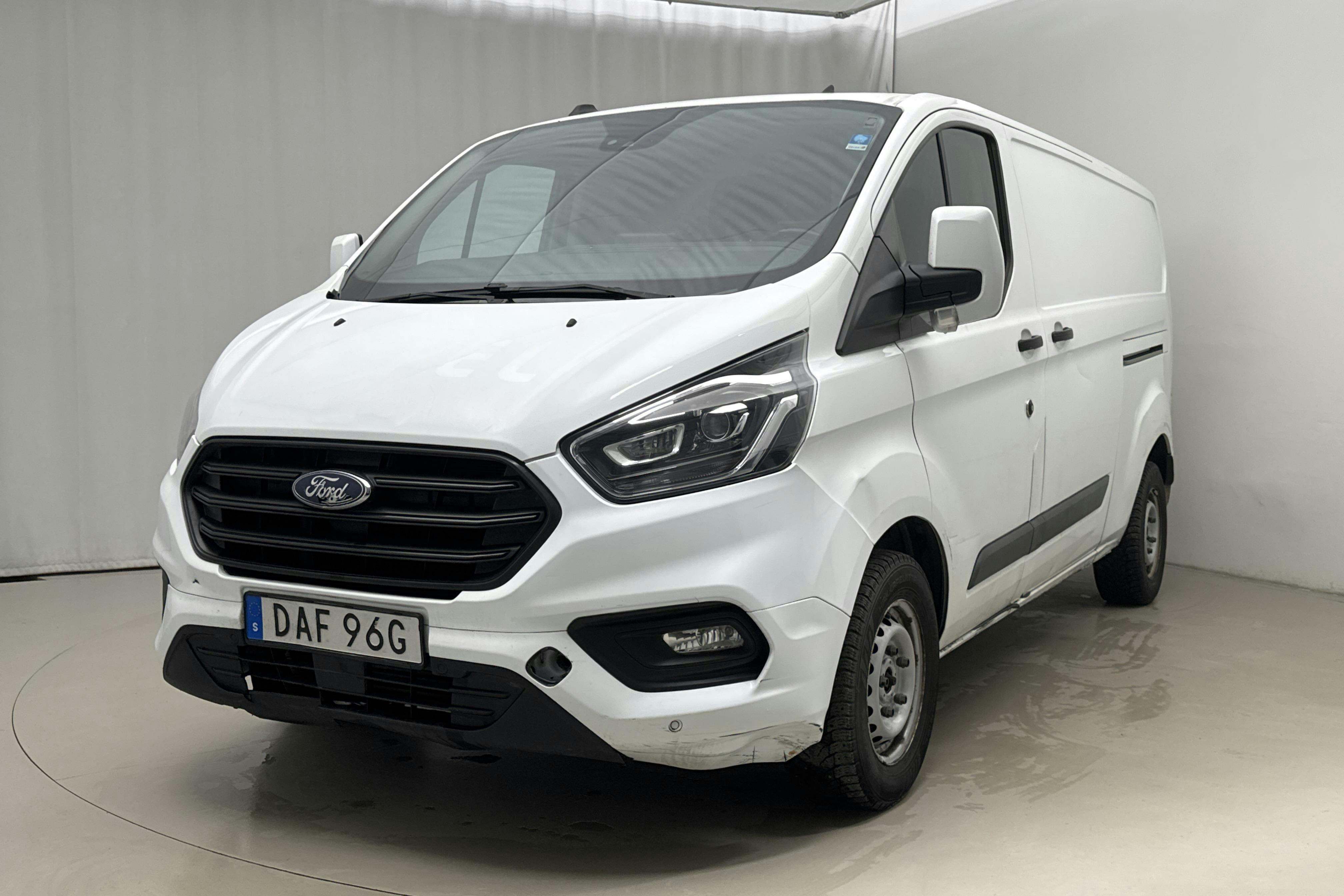 Zdjęcie prezentacyjne 1 z 21: Ford Transit Custom 300 MHEV (130hk) - 124 590 km - Manualna - biały - 2021