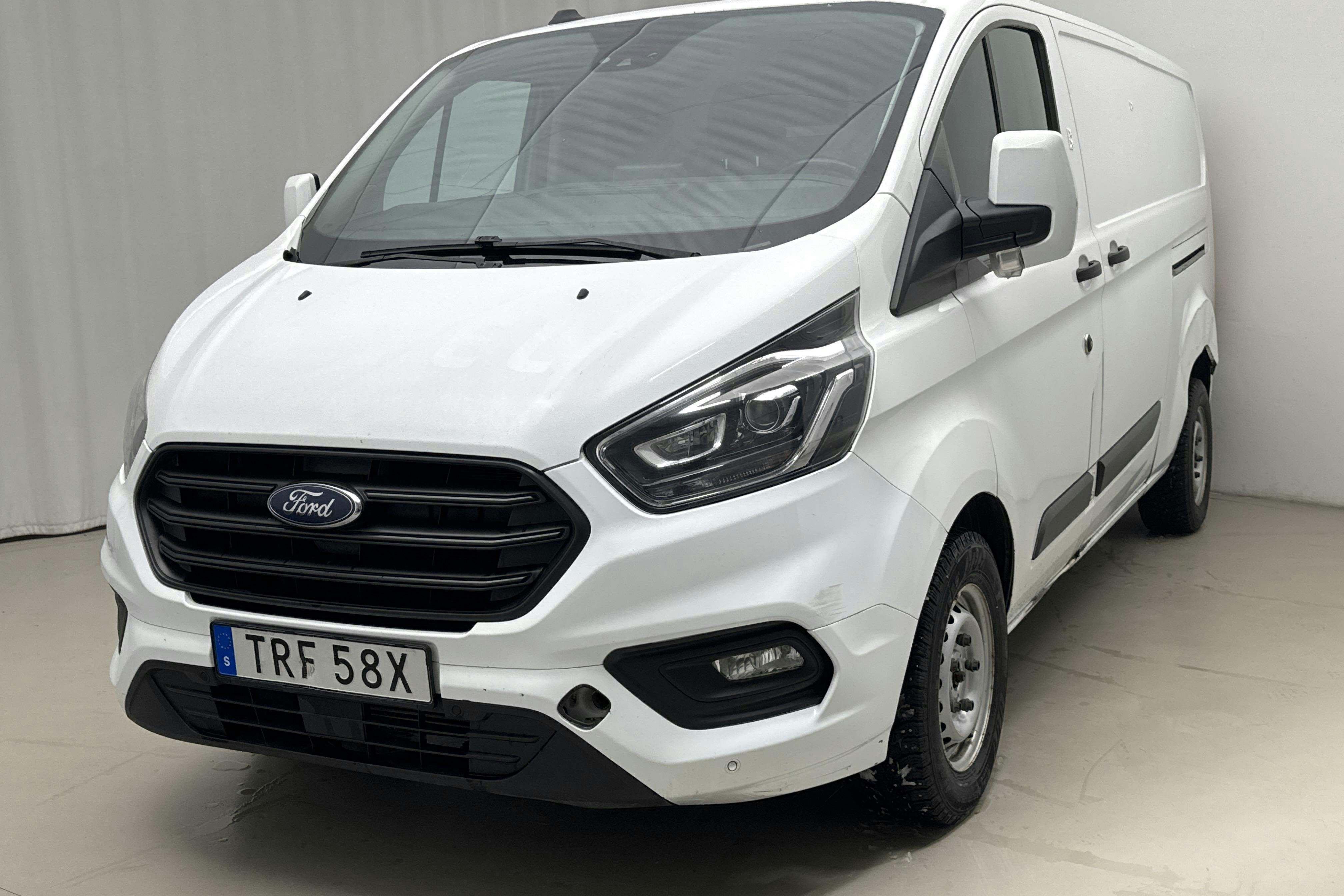 Presentation photo 1 of 12: Ford Transit Custom 300 MHEV (130hk) - 140 530 km - Manual - white - 2021