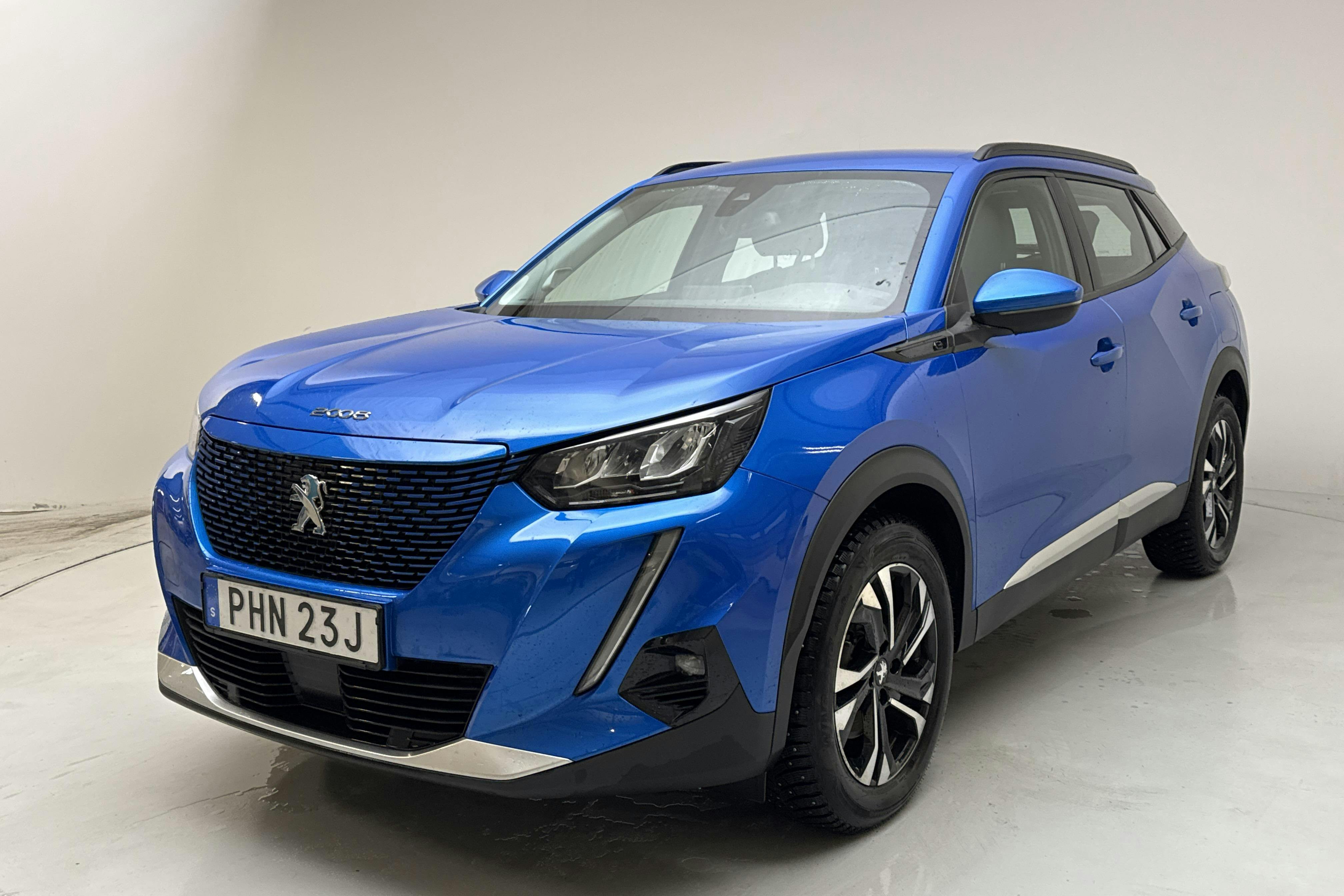 Presentation photo 1 of 16: Peugeot e-2008 50kWh (136hk) - 76 760 km - Automatic - blue - 2021