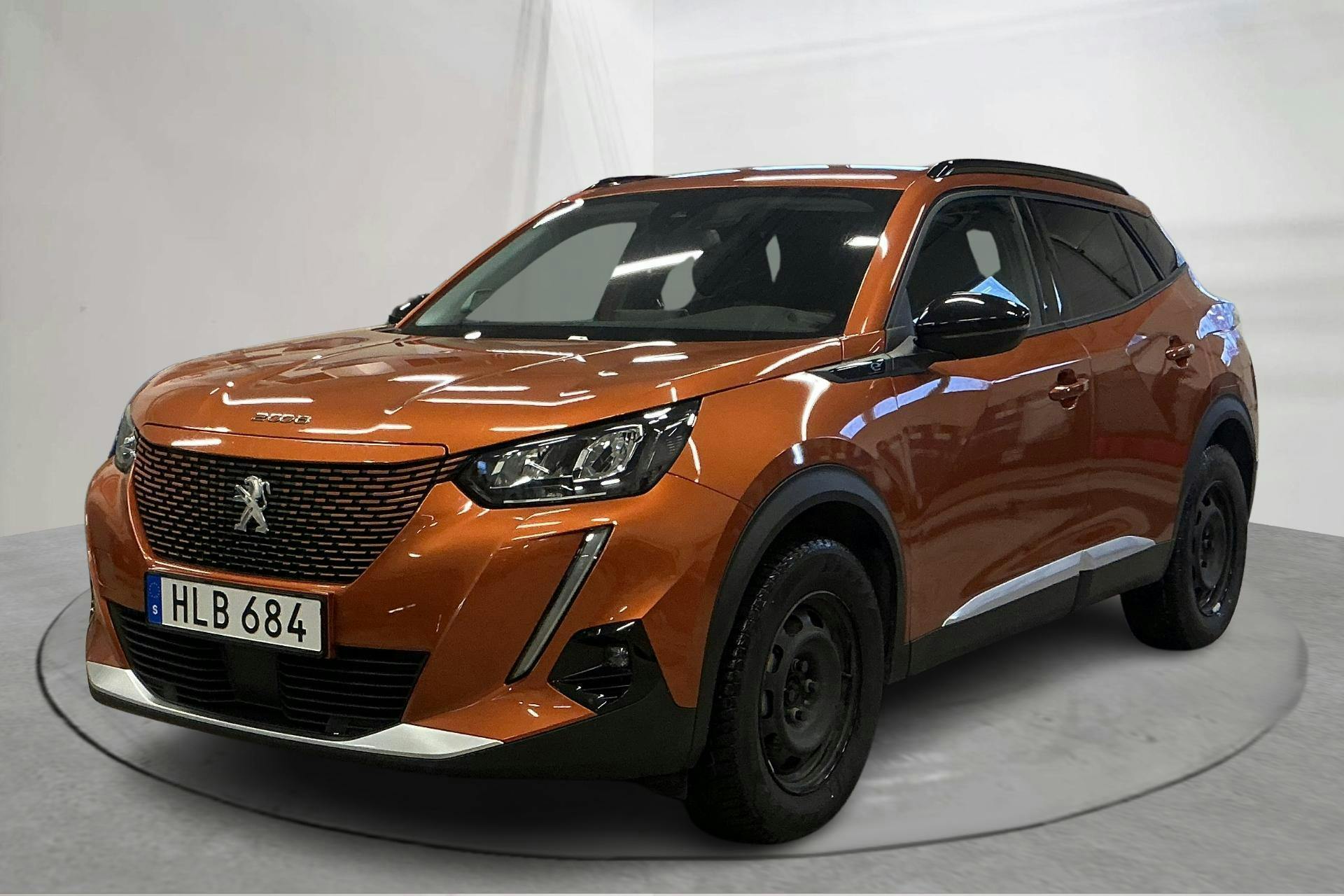 Presentation photo 1 of 19: Peugeot e-2008 50kWh (136hk) - 67 420 km - Automatic - orange - 2022