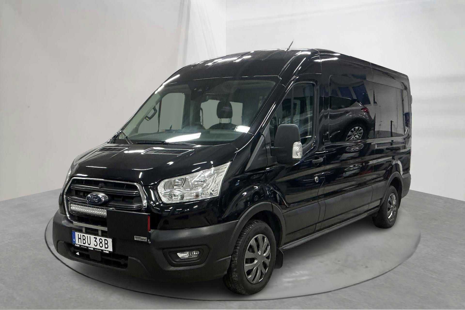 Præsentationsfoto 1 af 19: Ford Transit Kombi 310 (130hk) - 142 230 kilometer - Salgsautomat - Sort - 2022