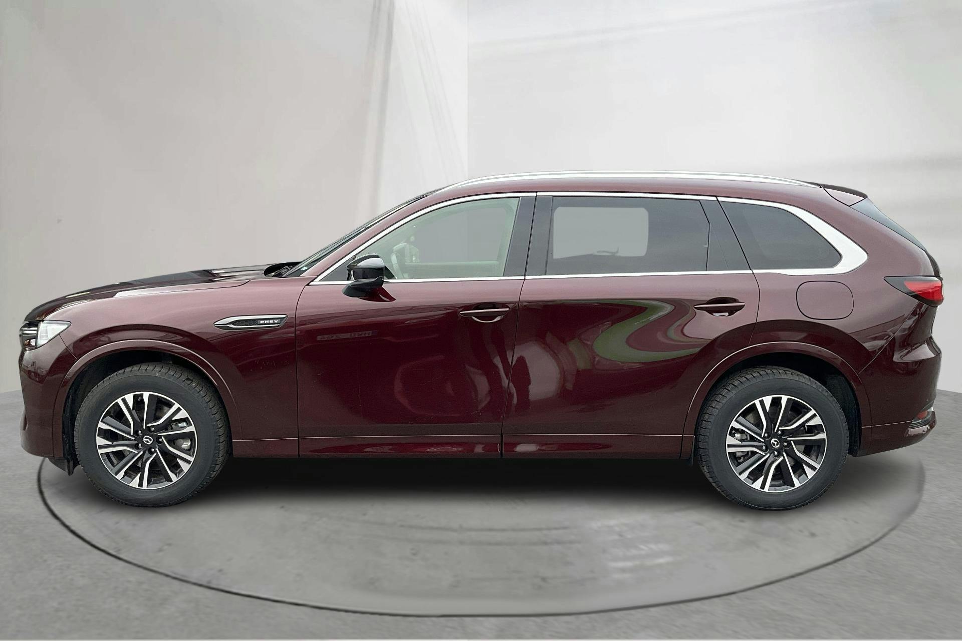 Præsentationsfoto 2 af 21: Mazda CX-80 e-Skyactiv PHEV AWD (327hk) - 18 330 kilometer - Salgsautomat - Rød farve - 2024