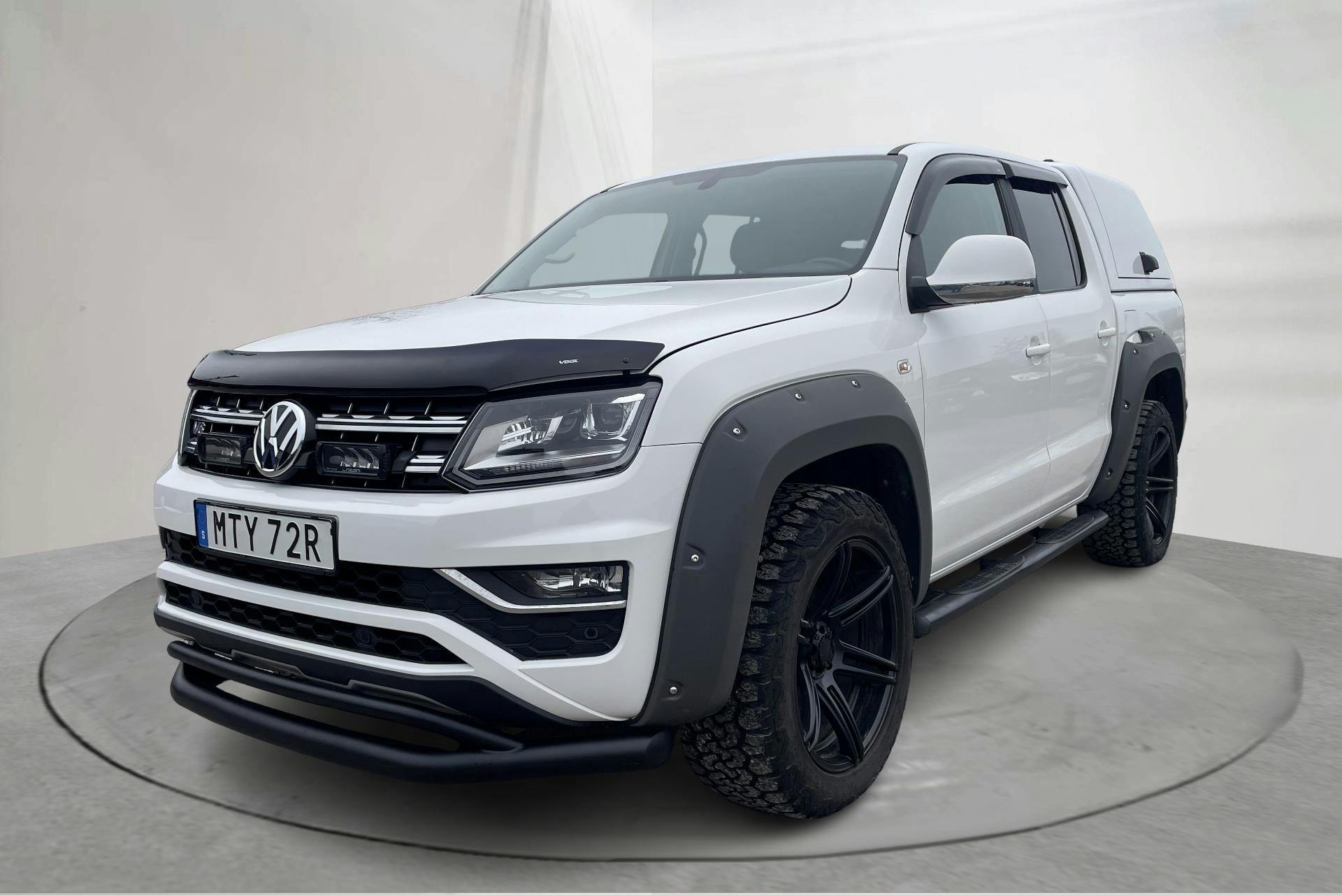 Präsentationsfoto 1 von 16: VW Amarok 3.0 TDI 4motion (258hk) - 152 050 Kilometer - Verkaufsautomat - Weiß - 2020