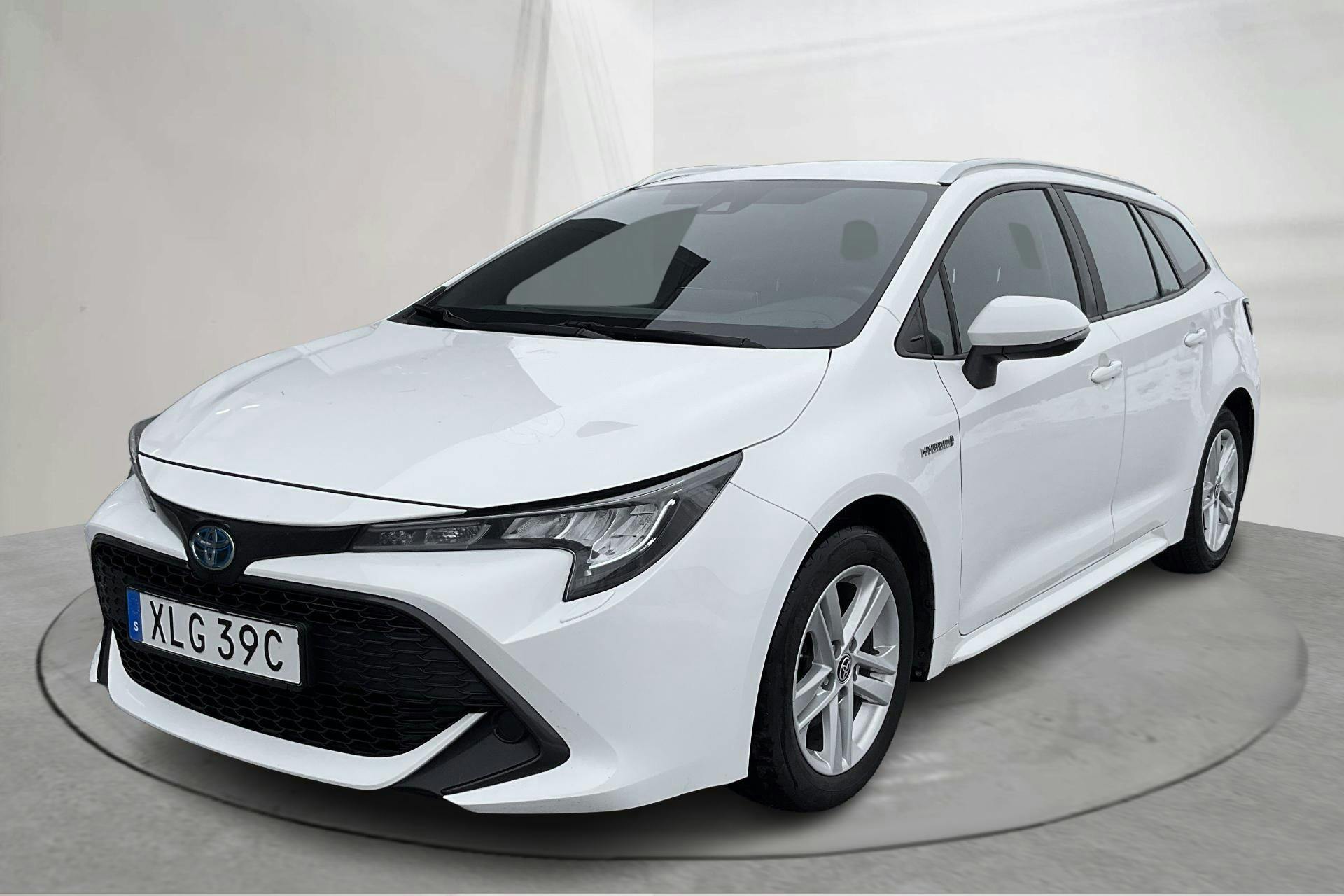 Presentation photo 1 of 13: Toyota Corolla 1.8 Hybrid Touring Sports (122hk) - 160 140 km - Automatic - white - 2021