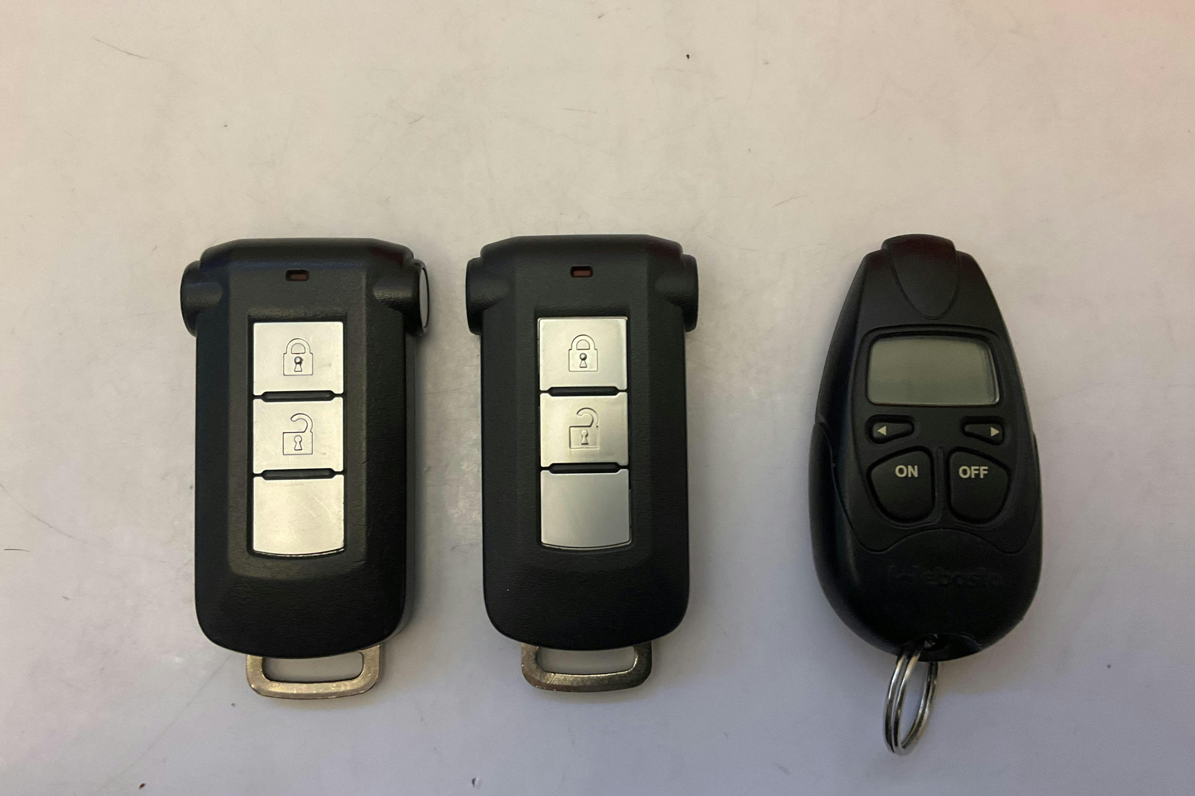 Præsentationsfoto 17 af 17: Mitsubishi Outlander 2.4 Plug-in Hybrid 4WD (136hk) - 107 290 kilometer - Salgsautomat - Hvid - 2019