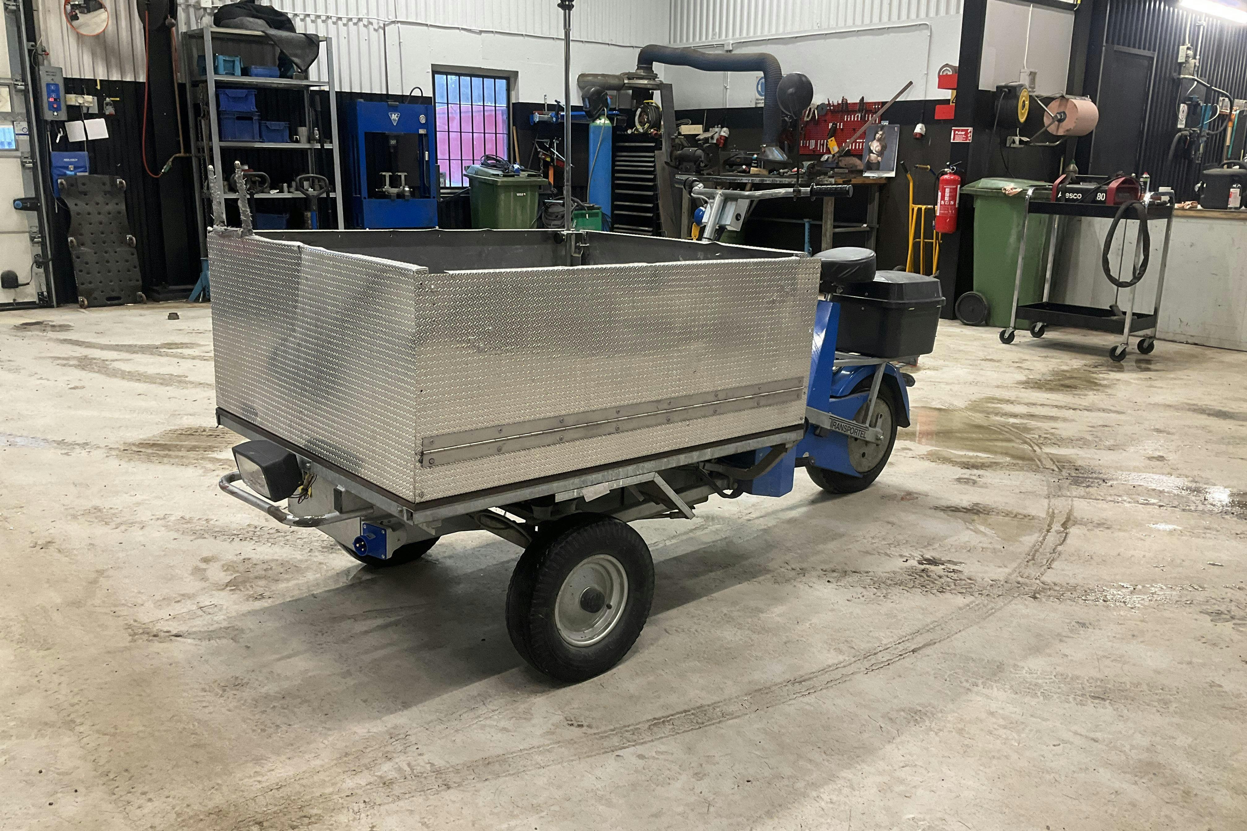 Præsentationsfoto 1 af 13: TRANSPORTEL 1200 COMBI Flakmoped eldriven - 0 kilometer - Salgsautomat - Blå farve - 2010