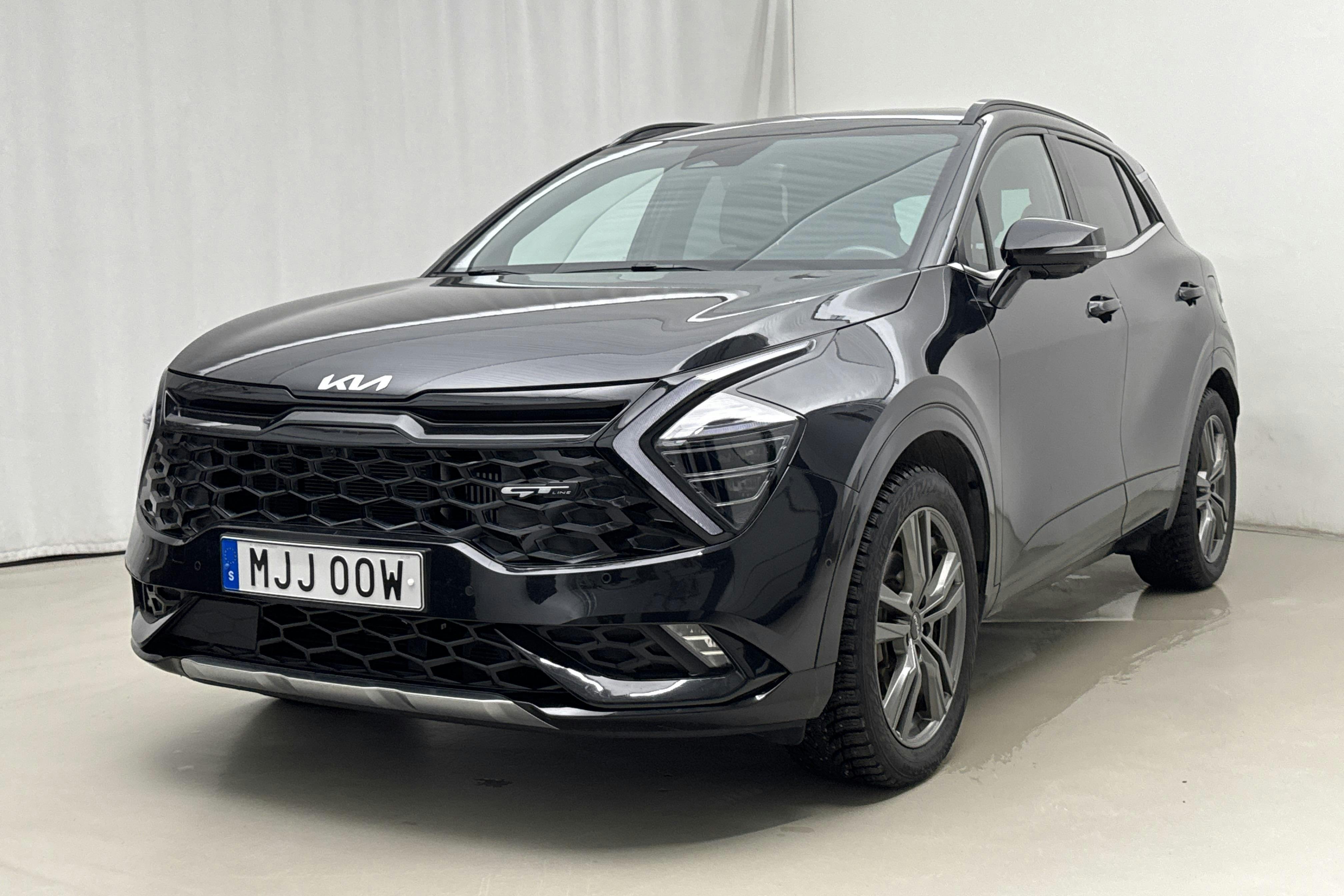 Presentationsfoto 1 av 23: KIA Sportage PHEV AWD (265hk) - 5 123 mil - Automat - svart - 2022