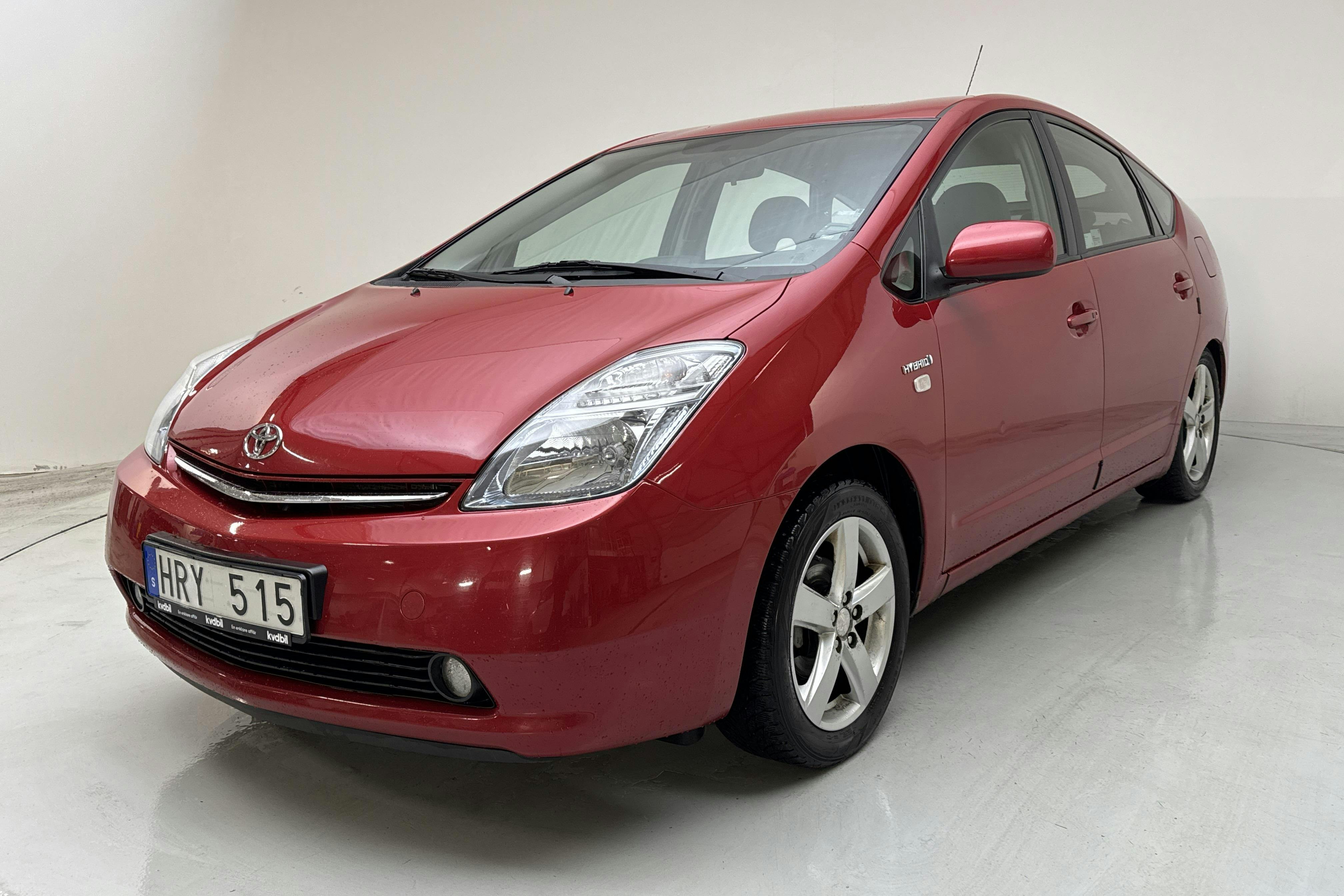 Præsentationsfoto 1 af 13: Toyota Prius 1.5 Hybrid (78hk) - 257 970 kilometer - Salgsautomat - Dark Red - 2008