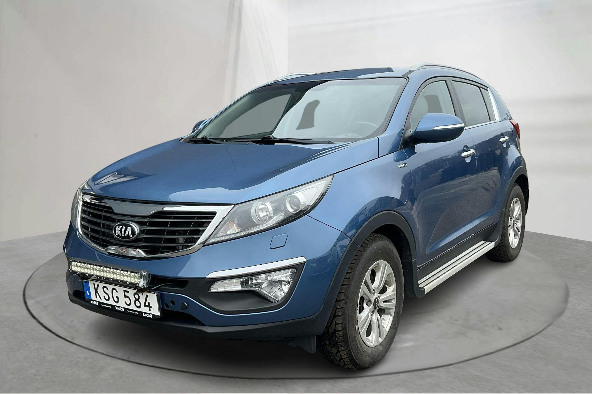 Præsentationsfoto 1 af 15: KIA Sportage 2.0 CRDi AWD (184hk) - 198 090 kilometer - Salgsautomat - Blå farve - 2014