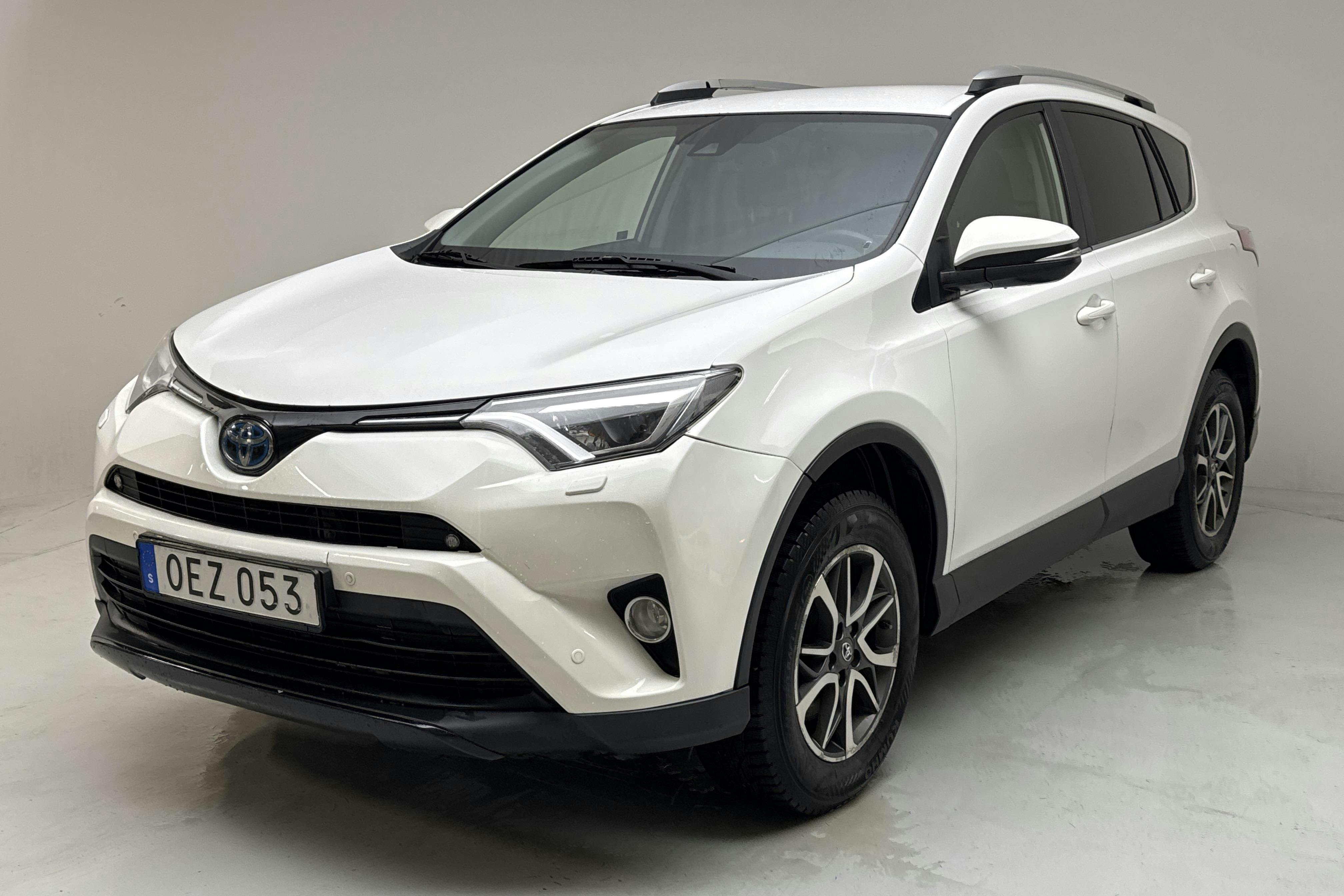 Presentation photo 1 of 14: Toyota RAV4 2.5 HSD AWD (197hk) - 383 920 km - Automatic - white - 2016