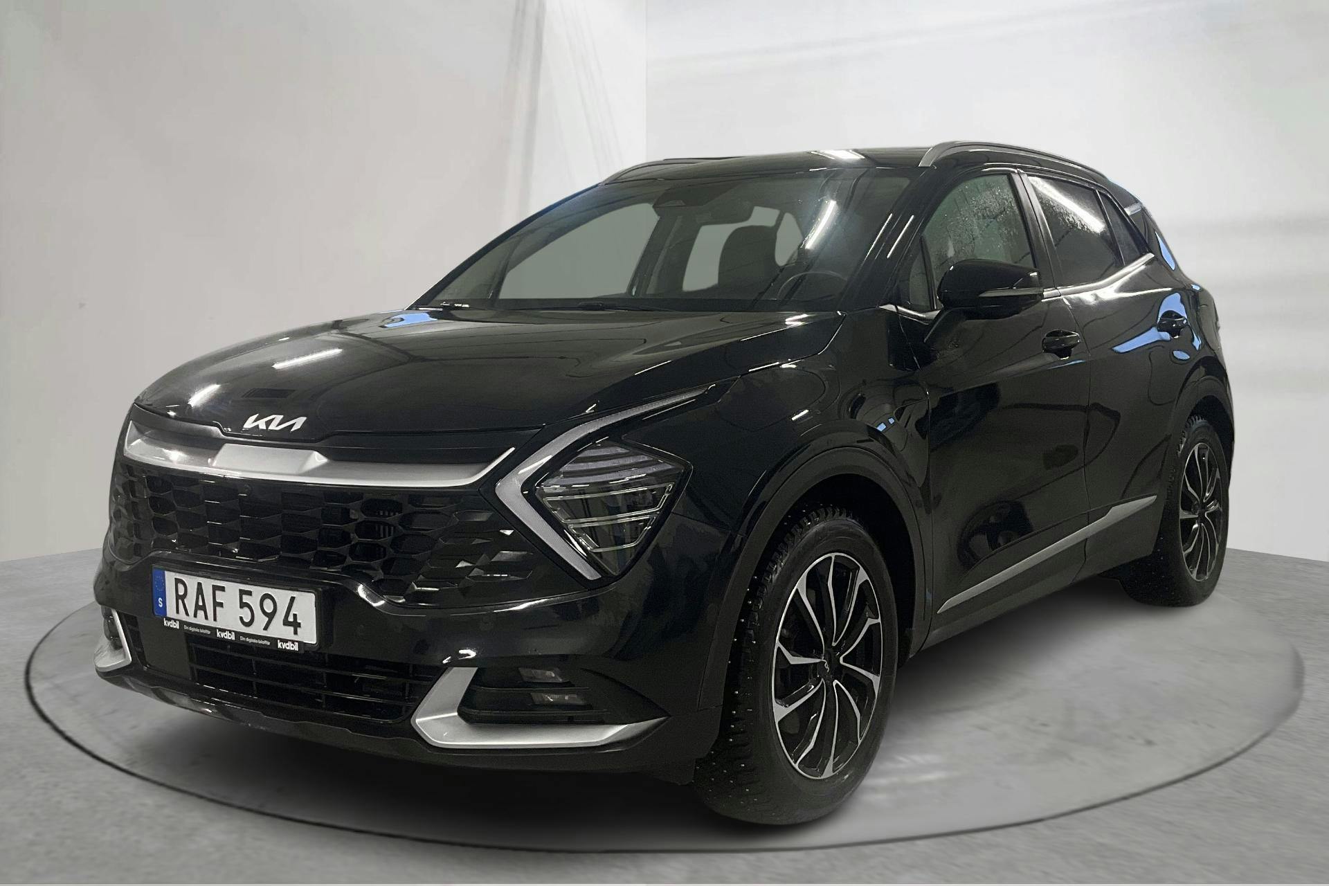 Præsentationsfoto 1 af 24: KIA Sportage PHEV AWD (265hk) - 90 350 kilometer - Salgsautomat - Sort - 2023