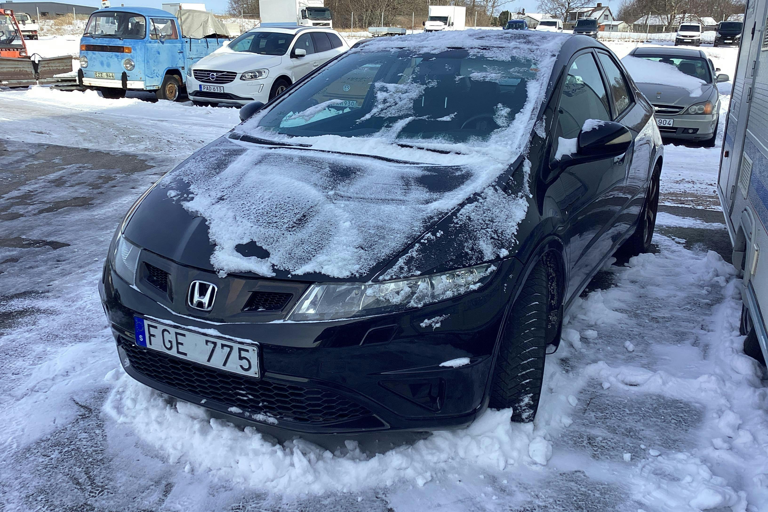 Zdjęcie prezentacyjne 1 z 12: Honda Civic 1.4 5dr (100hk) - 156 420 km - Manualna - czarny - 2011