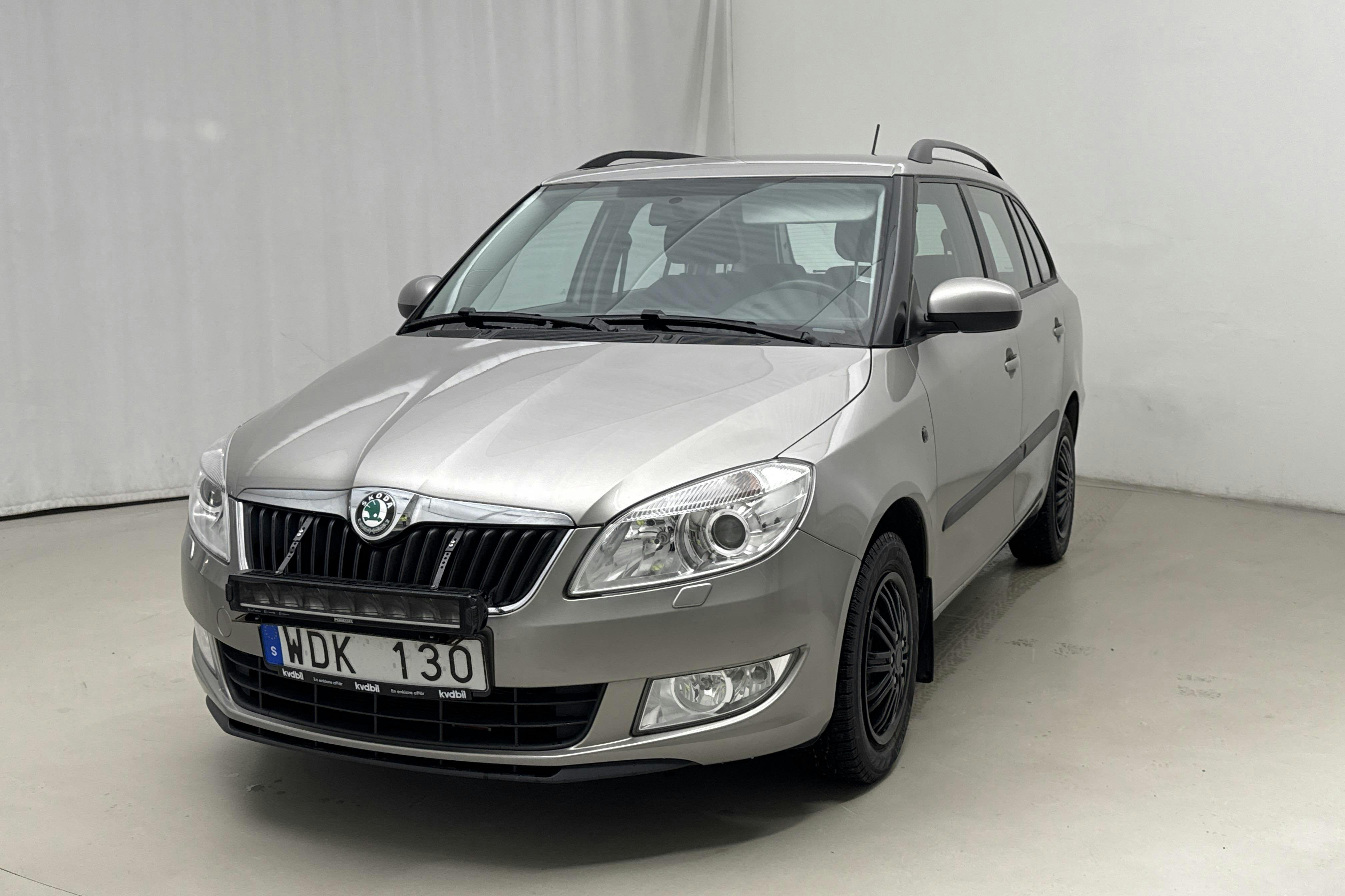Præsentationsfoto 1 af 11: Skoda Fabia 1.2 TSI Combi (86hk) - 124 180 kilometer - Manuel - Light Brown - 2012