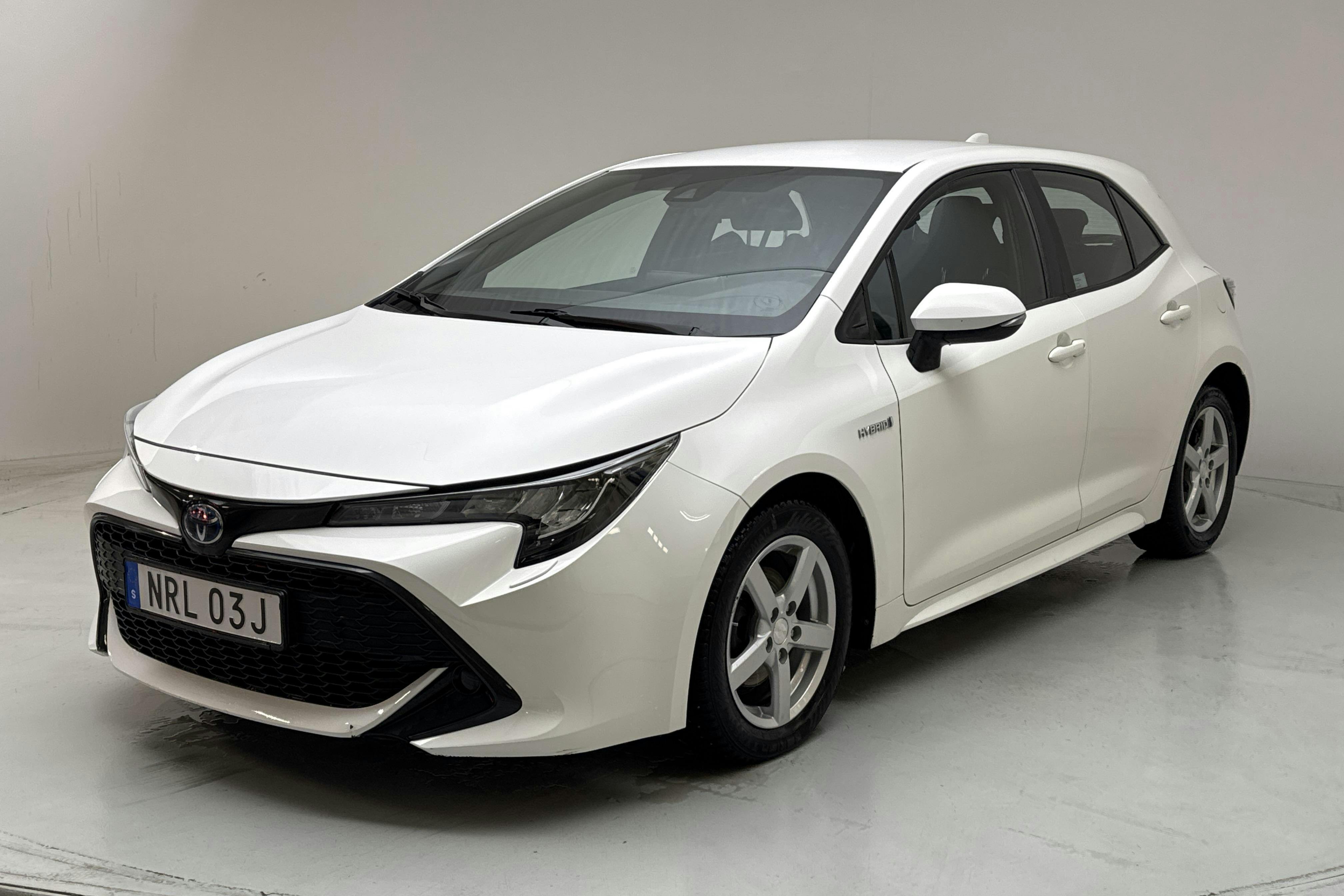 Presentation photo 1 of 14: Toyota Corolla 1.8 Hybrid 5dr (122hk) - 159 320 km - Automatic - white - 2020