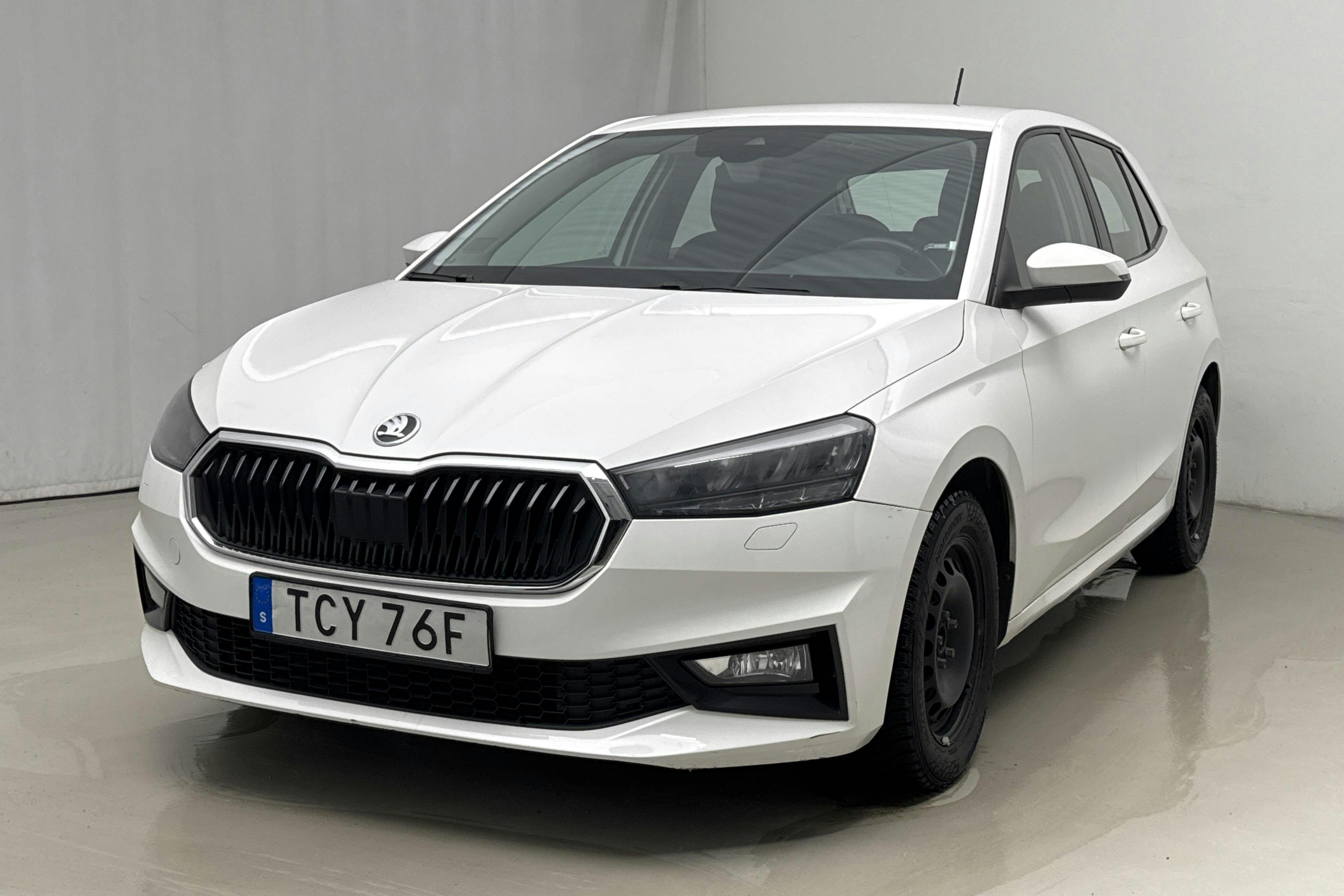 Presentation photo 1 of 19: Skoda Fabia 1.0 TSI (110hk) - 165 900 km - Automatic - white - 2022