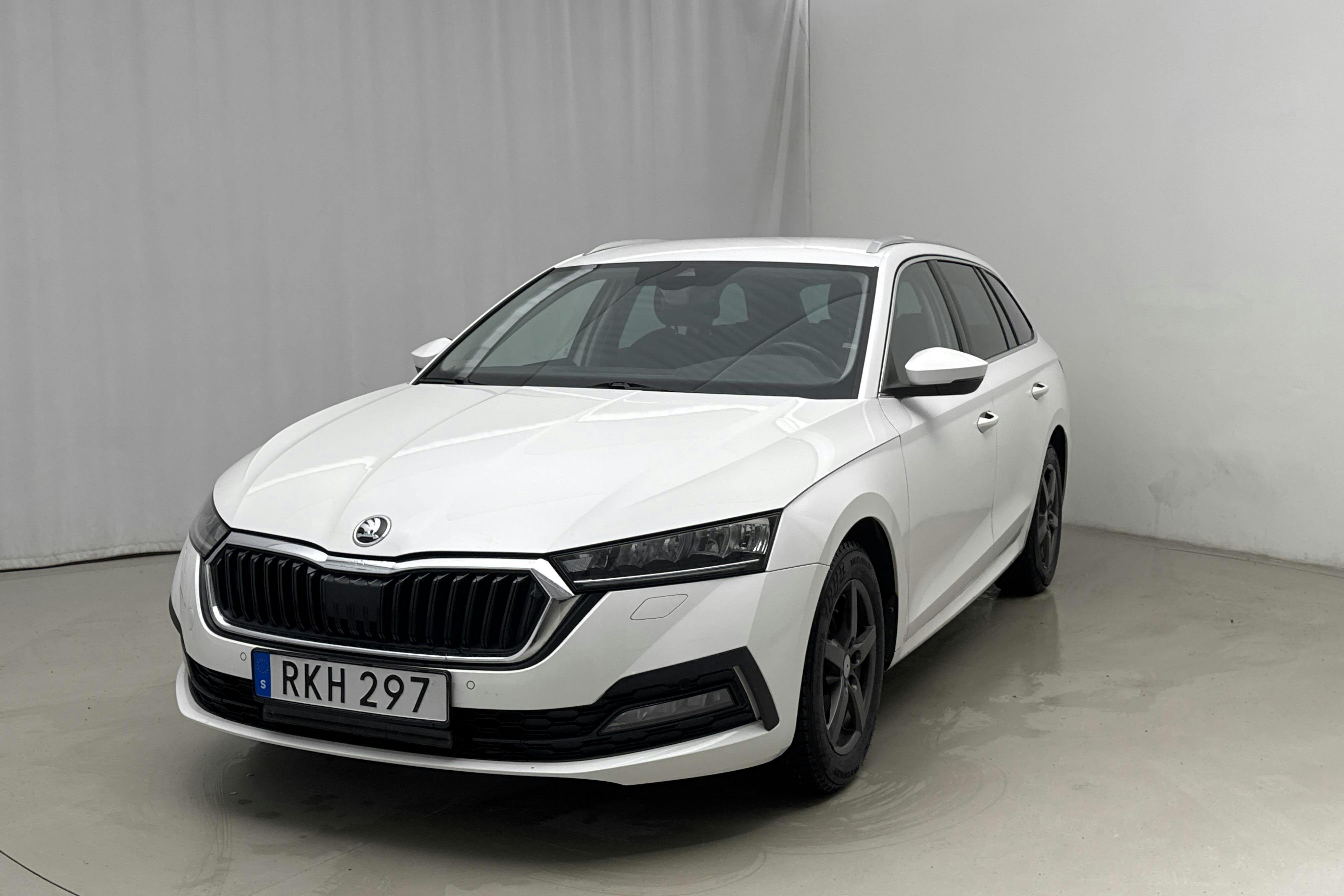 Presentation photo 1 of 16: Skoda Octavia 2.0 TDI Combi (116hk) - 154 660 km - Automatic - white - 2022